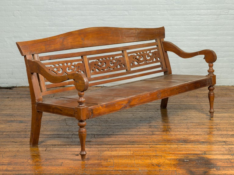 Dutch Colonial Antique Wooden Bench with Carved Camelback and Scrolling