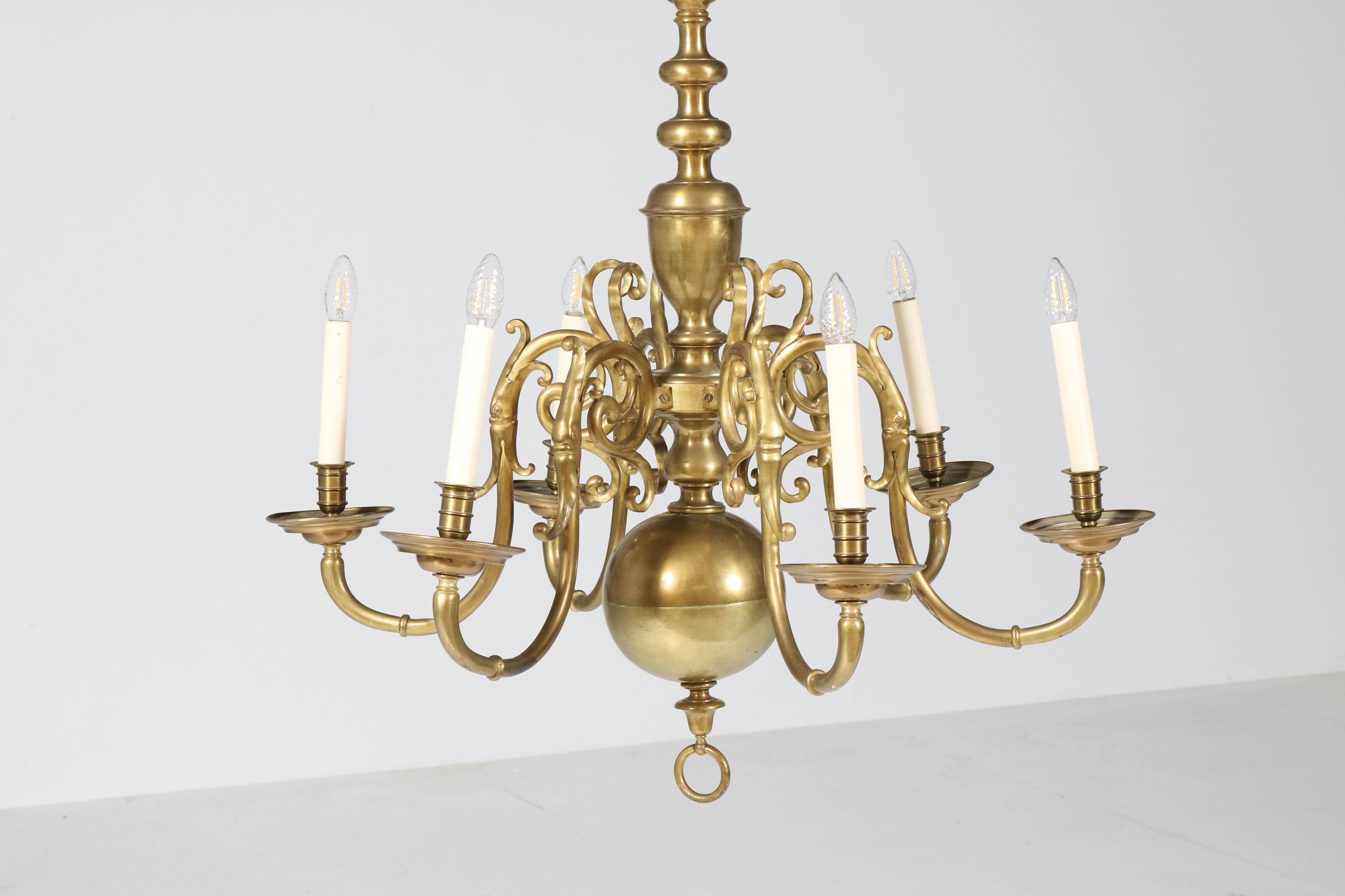 Wonderful Dutch colonial baroque chandelier.
Solid patinated brass and rewired.
In good original condition with minor wear consistent with age and use,
preserving a beautiful patina.