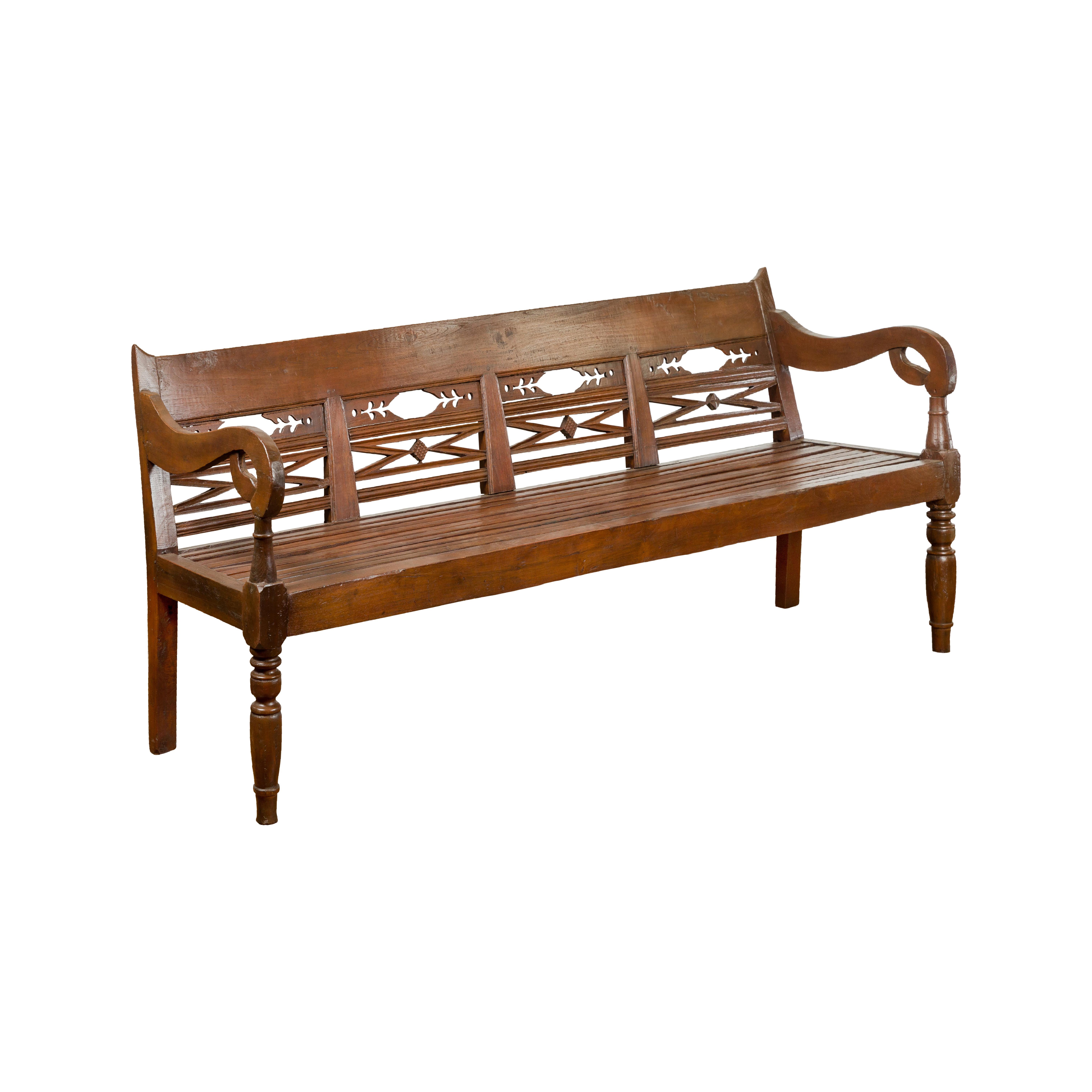 Dutch Colonial Bench with Carved Back, Scrolling Arms and Turned Baluster Legs For Sale 10