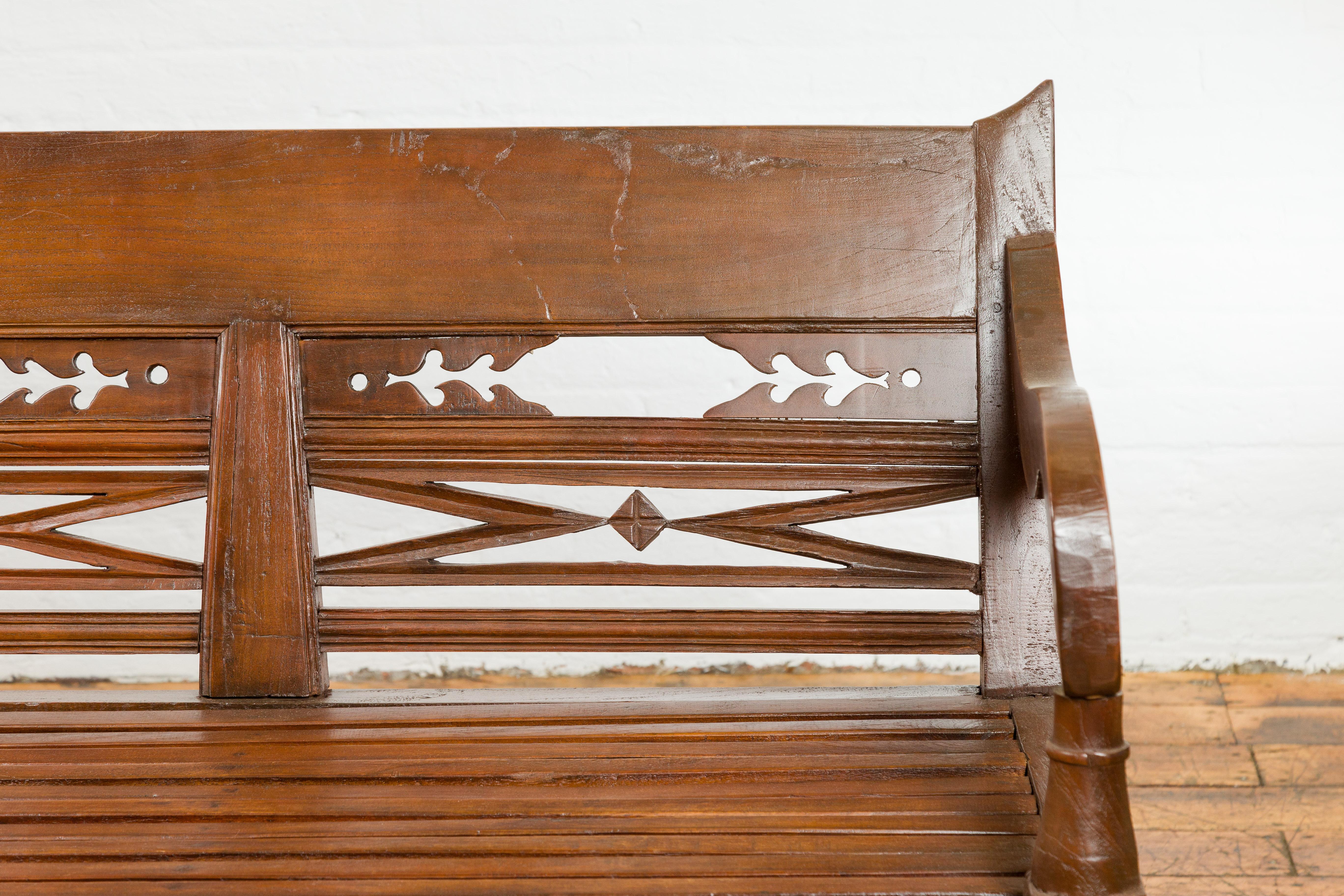 Dutch Colonial Bench with Carved Back, Scrolling Arms and Turned Baluster Legs For Sale 2