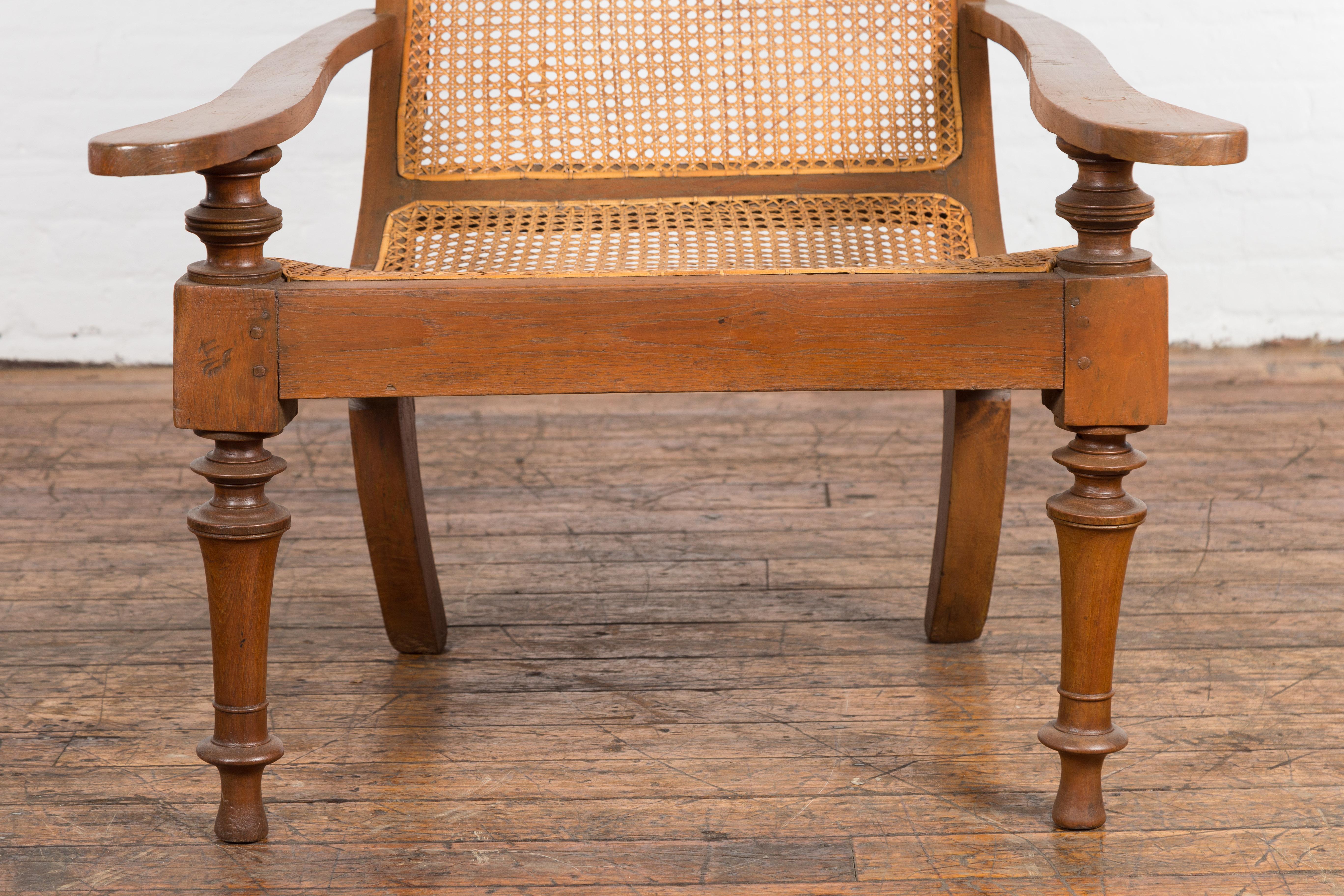 Indonesian Antique Wooden Chair with Extended Back For Sale