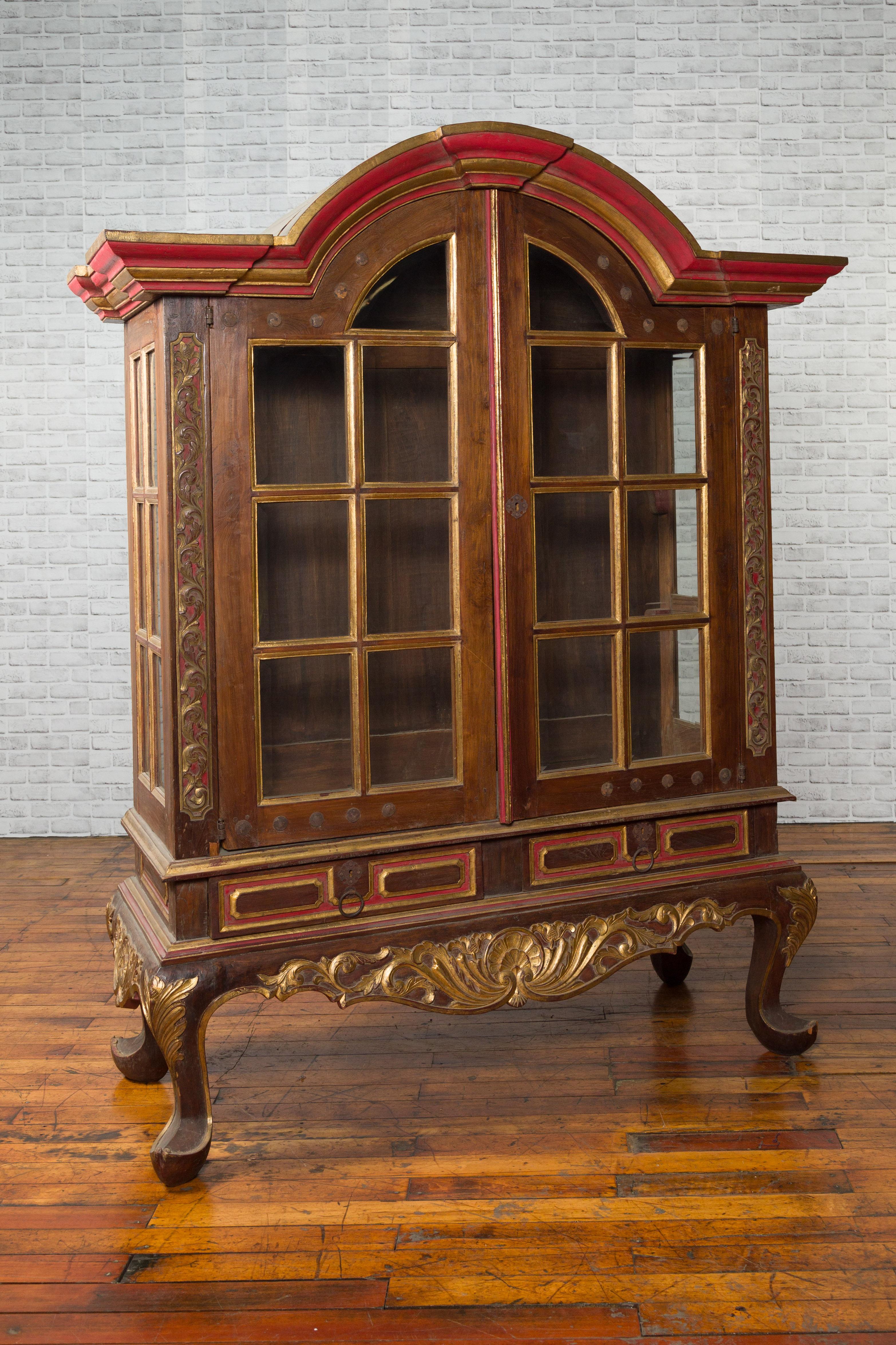 Indonesian Dutch Colonial Early 20th Century Bonnet Top Gilded Cabinet with Glass Doors For Sale