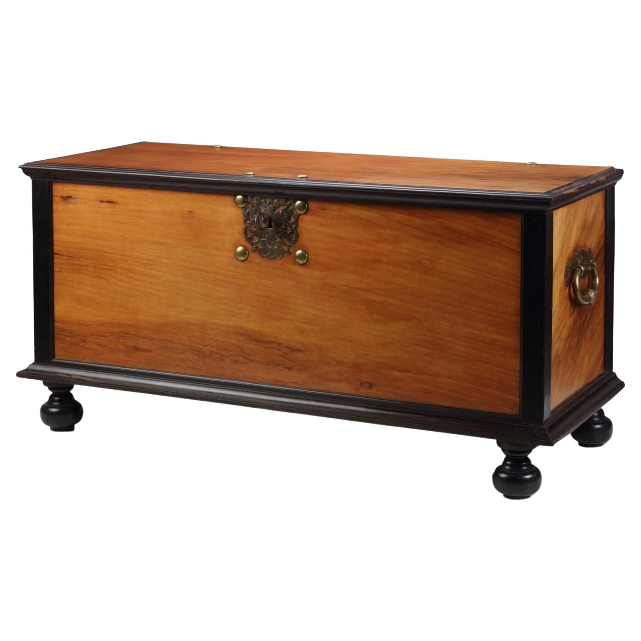 Dutch-colonial five-foot 18th century amboyna wood VOC chest with brass mounts For Sale