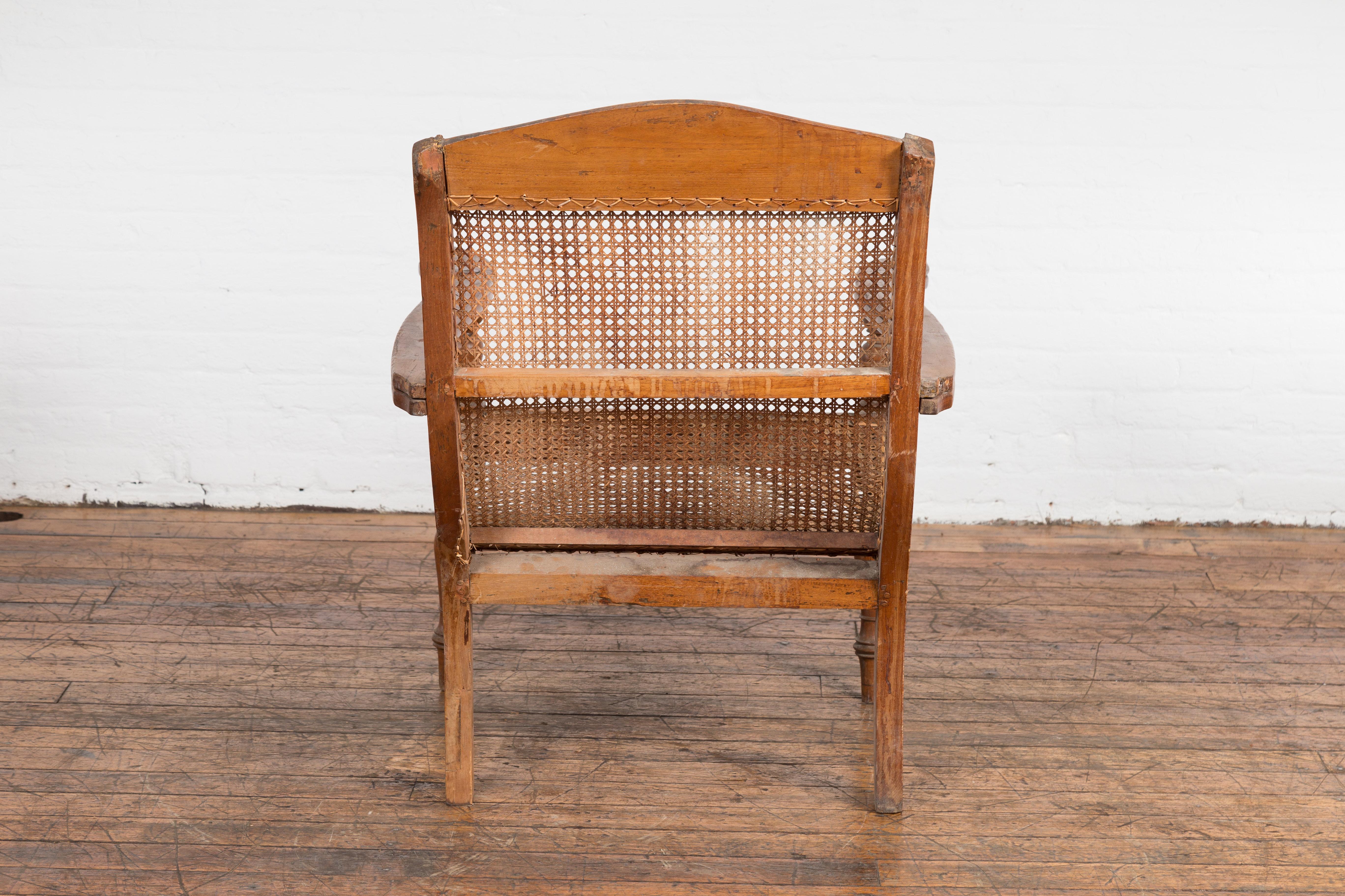 Dutch Colonial Indonesian Cane and Wood Plantation Chair with Extending Arms For Sale 10