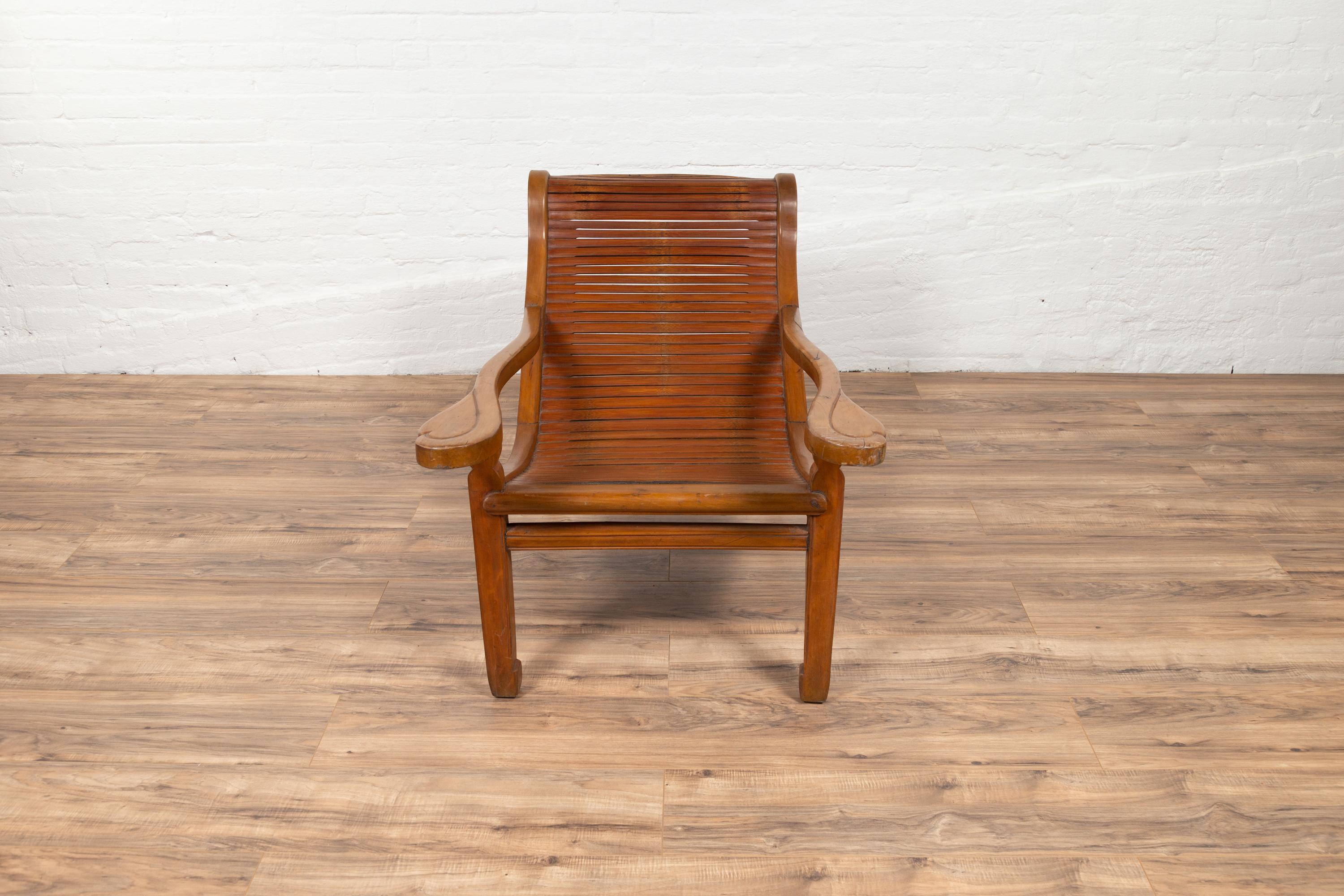 Dutch Colonial 1900s Plantation Lounge Chair with Curving Seat and Slats For Sale 1