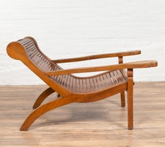 Dutch Colonial 1900s Plantation Lounge Chair with Curving Seat and Slats