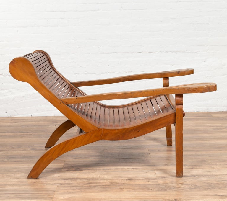 Dutch Colonial Indonesian Plantation Lounge Chair With Curving Seat And Slats For Sale At 1stdibs