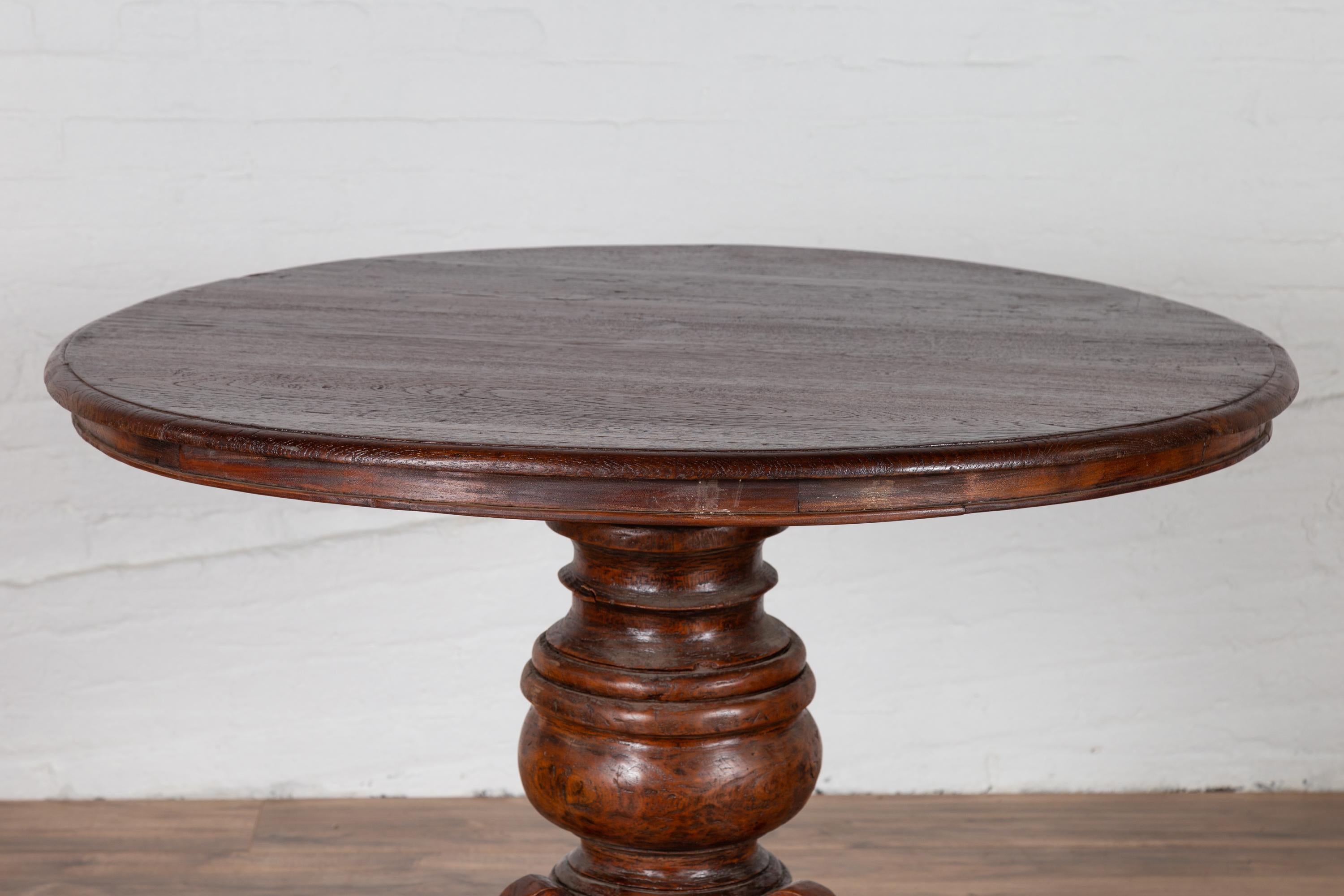 Dutch Colonial Javanese Pedestal Tripod Table with Circular Top and Turned Base In Good Condition In Yonkers, NY
