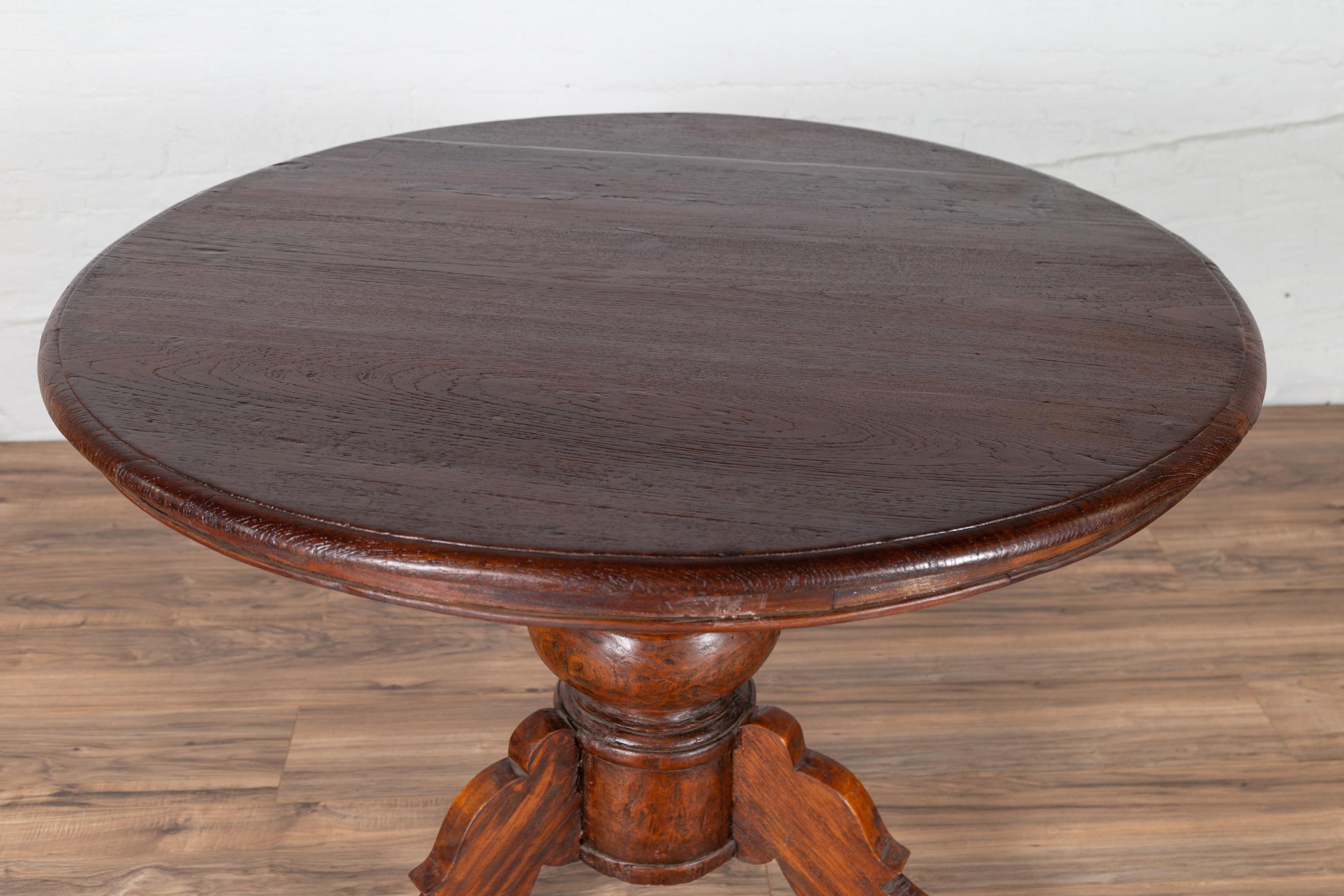 20th Century Dutch Colonial Javanese Pedestal Tripod Table with Circular Top and Turned Base
