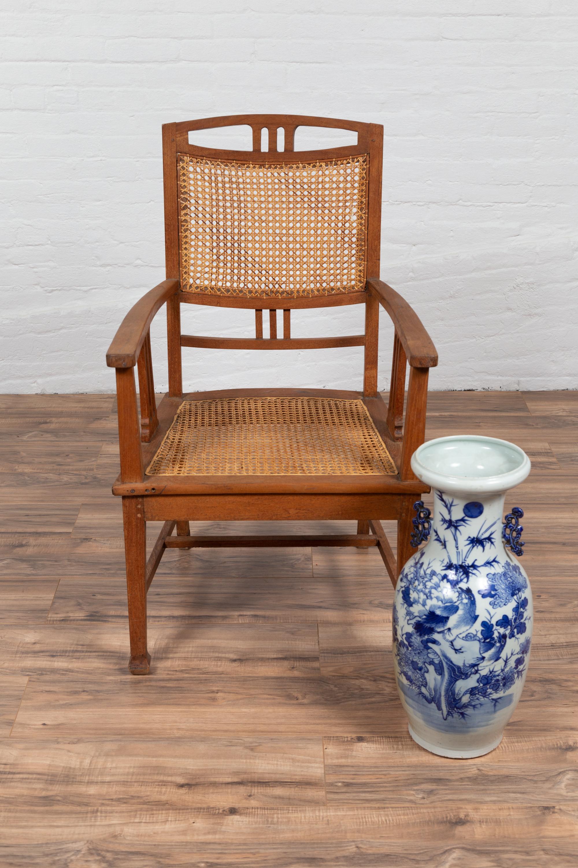 Dutch Colonial Javanese Teak Armchair with Rattan and Triglyph Inspired Motifs For Sale 10