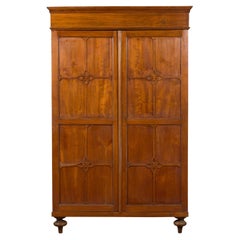 Dutch Colonial Javanese Teak Armoire with Carved Doors and Turned Toupie Feet