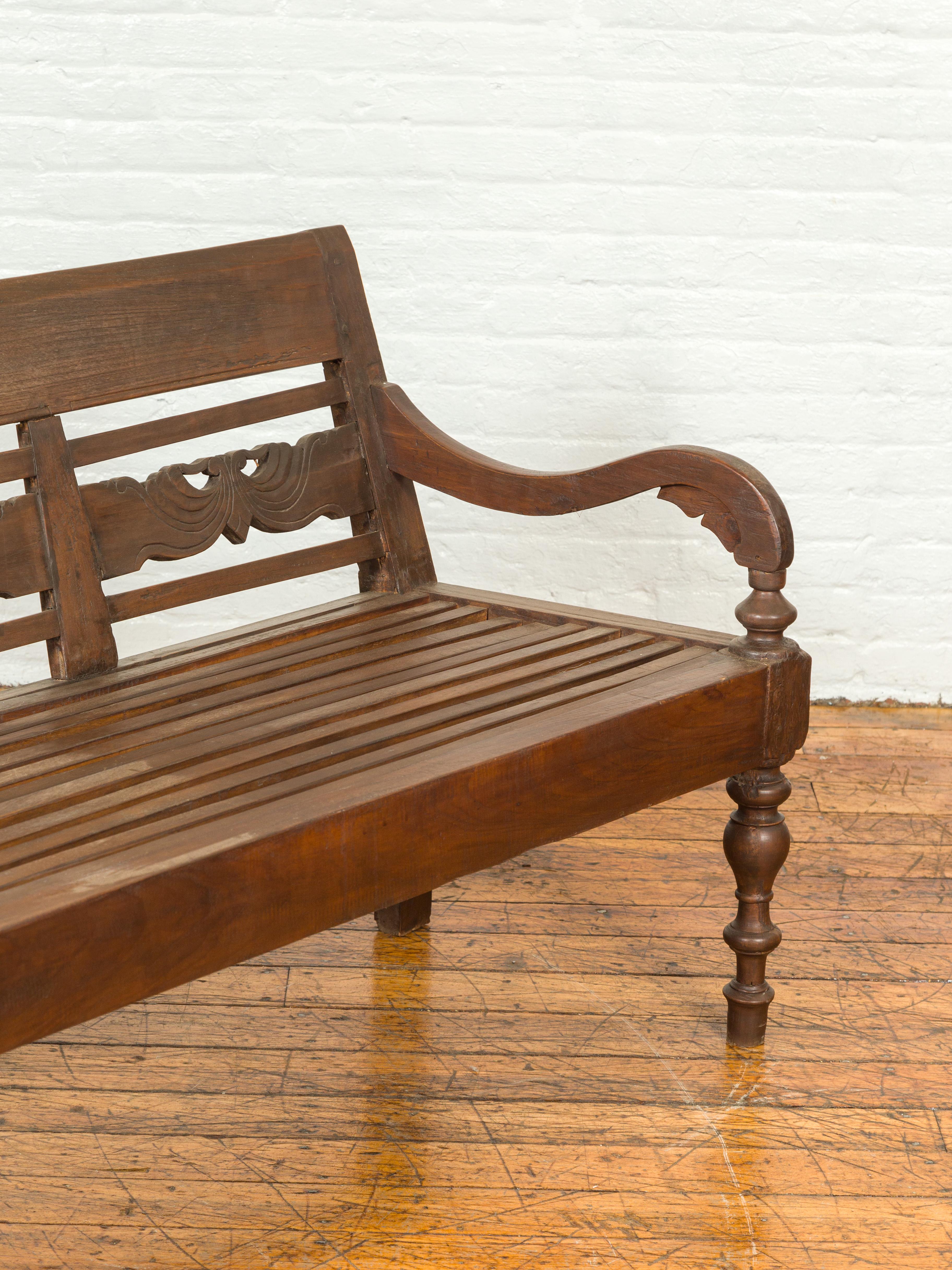 Dutch Colonial Late 19th Century Bench with Carved Back and Scrolling Arms 2