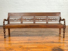 Dutch Colonial Late 19th Century Bench with Carved Back and Scrolling Arms