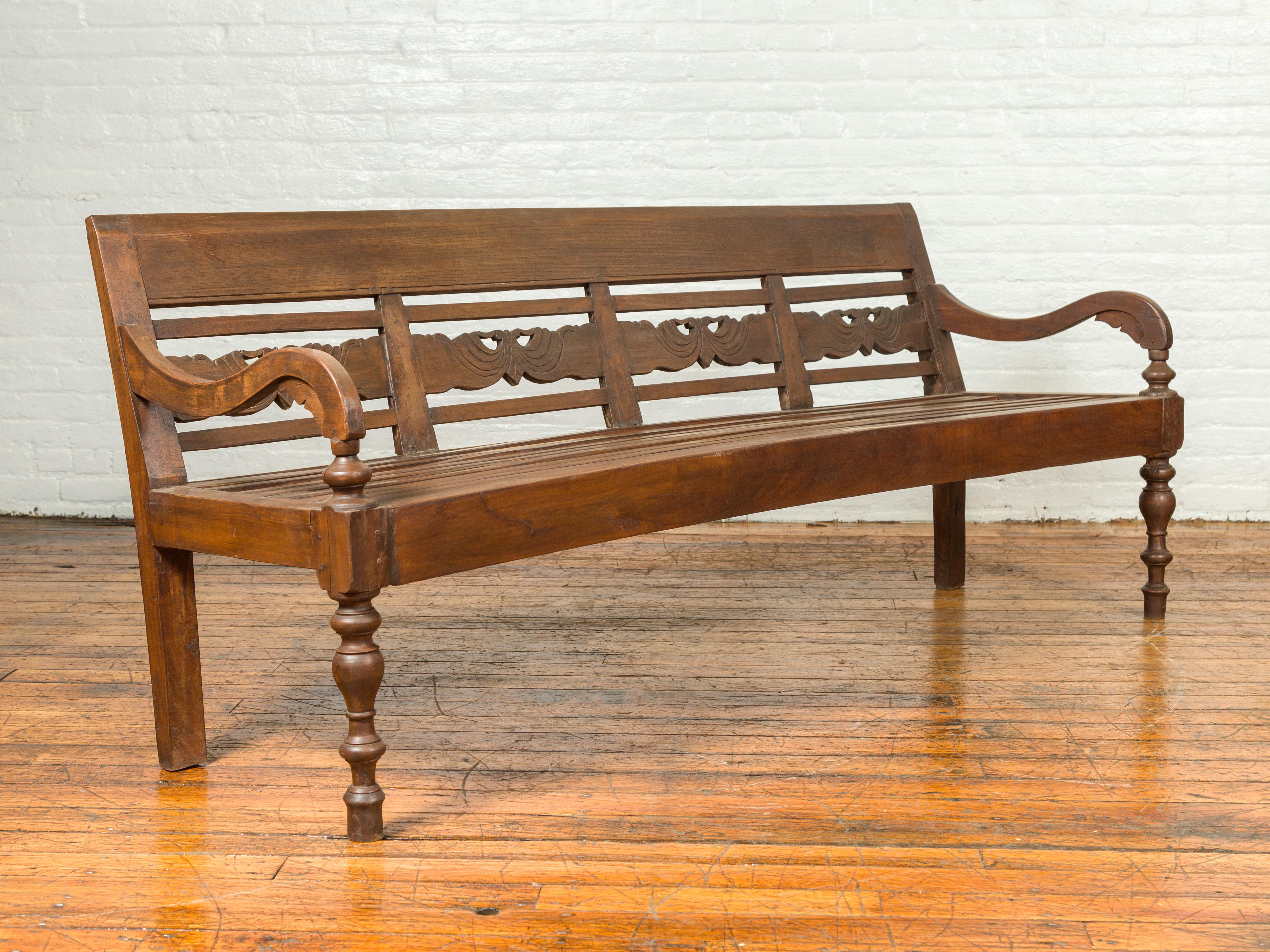 carved wooden benches