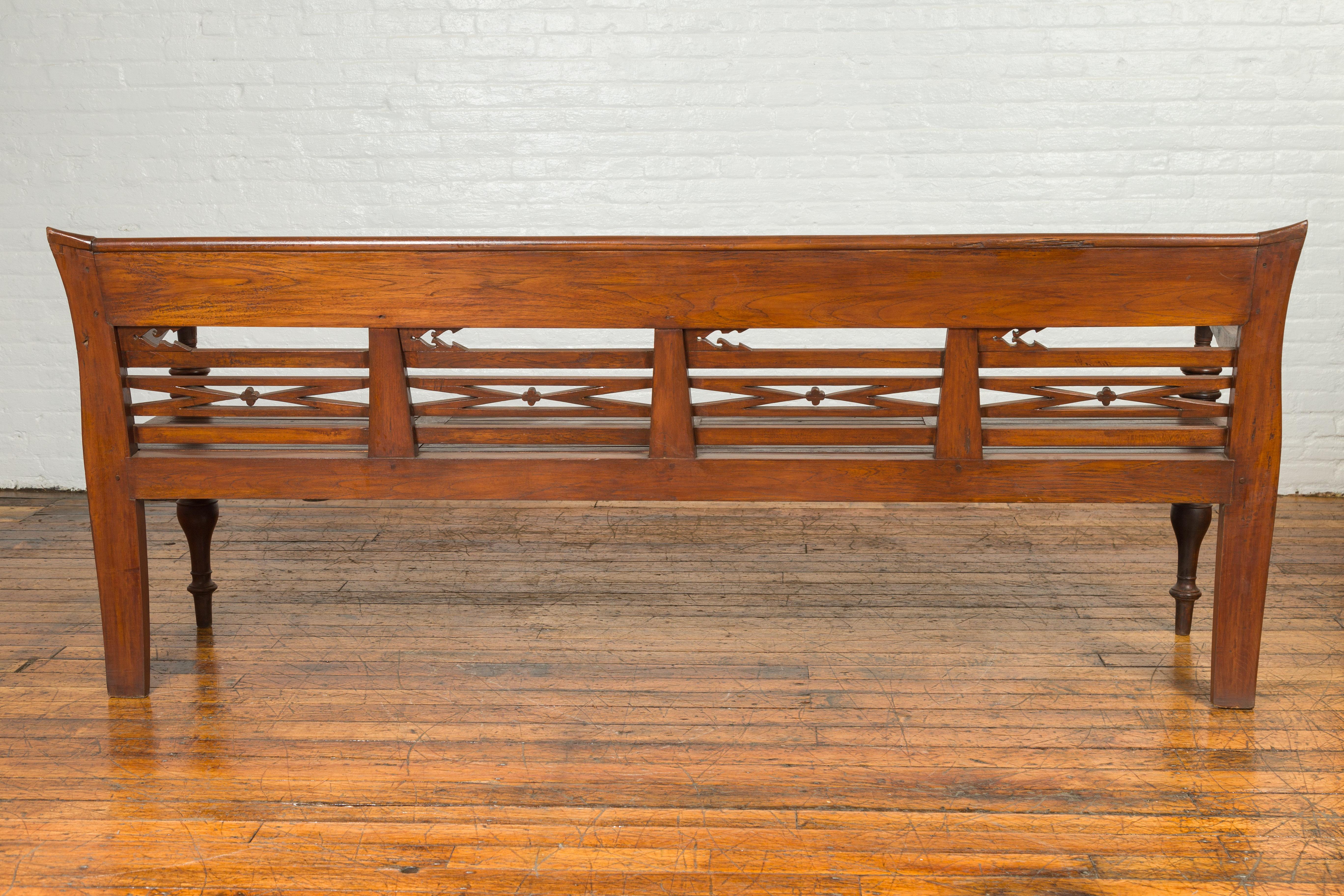 Dutch Colonial Late 19th Century Bench with Pierced Back and Scrolling Arms 6