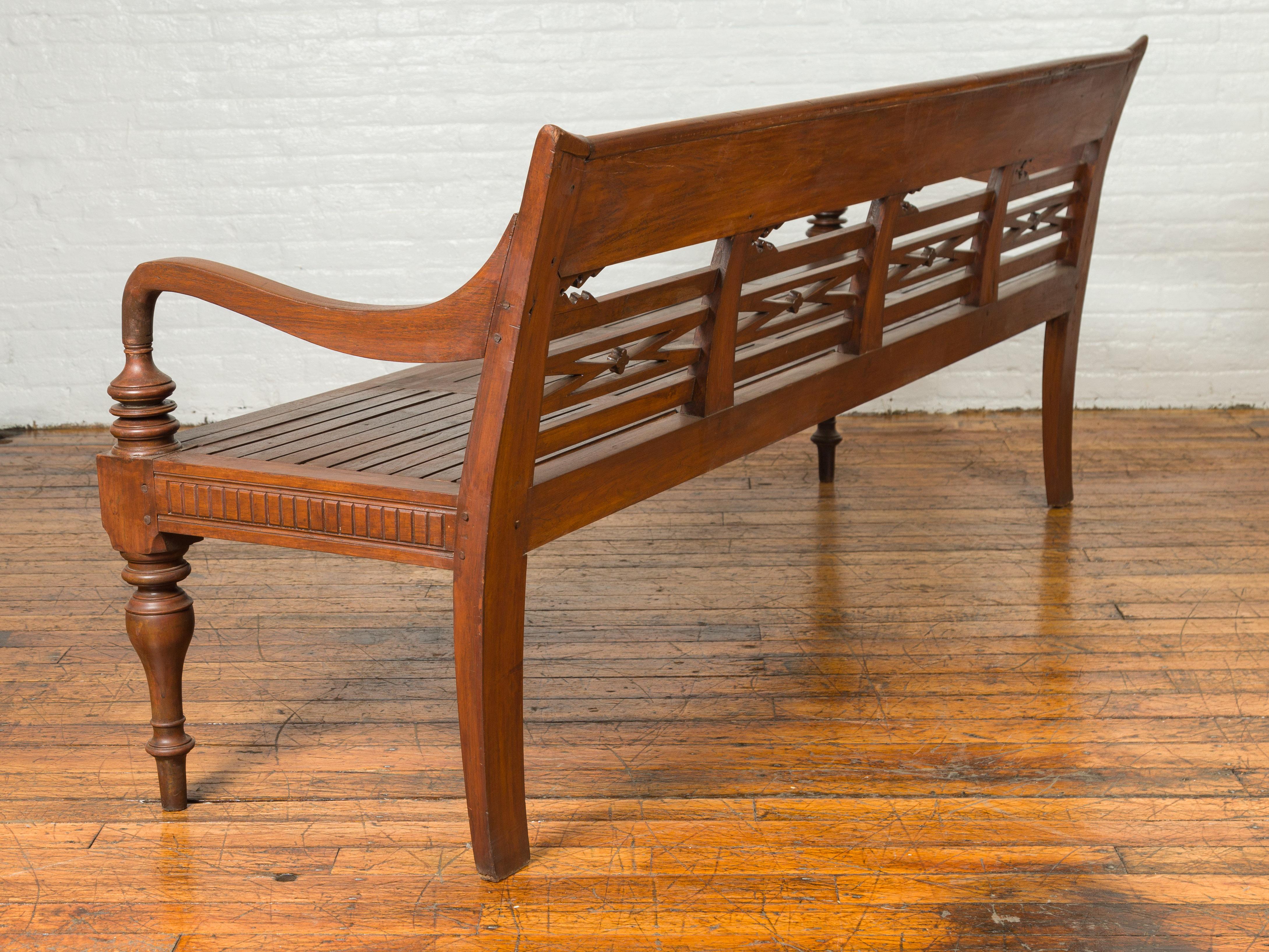 Dutch Colonial Late 19th Century Bench with Pierced Back and Scrolling Arms 7