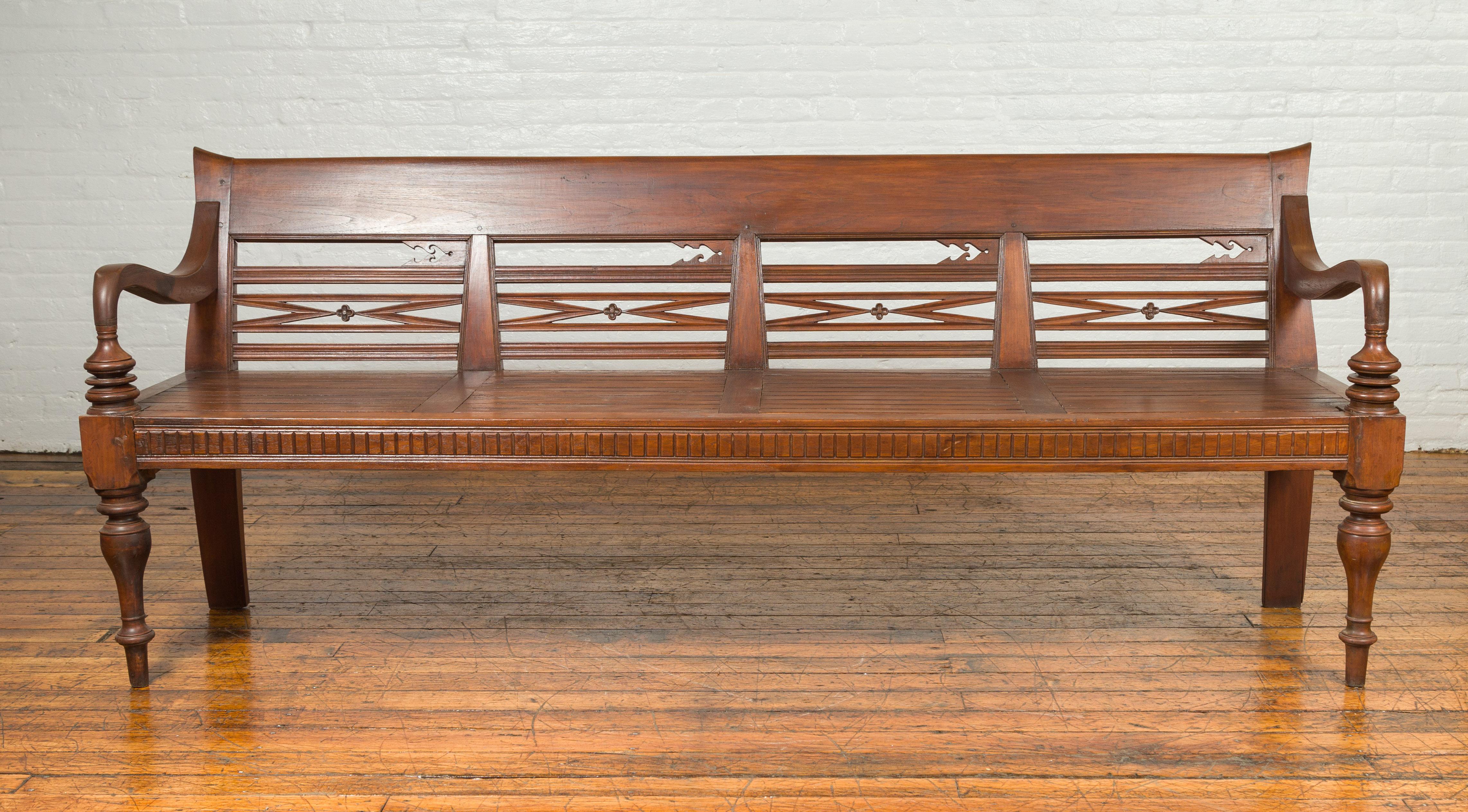 Indonesian Dutch Colonial Late 19th Century Bench with Pierced Back and Scrolling Arms