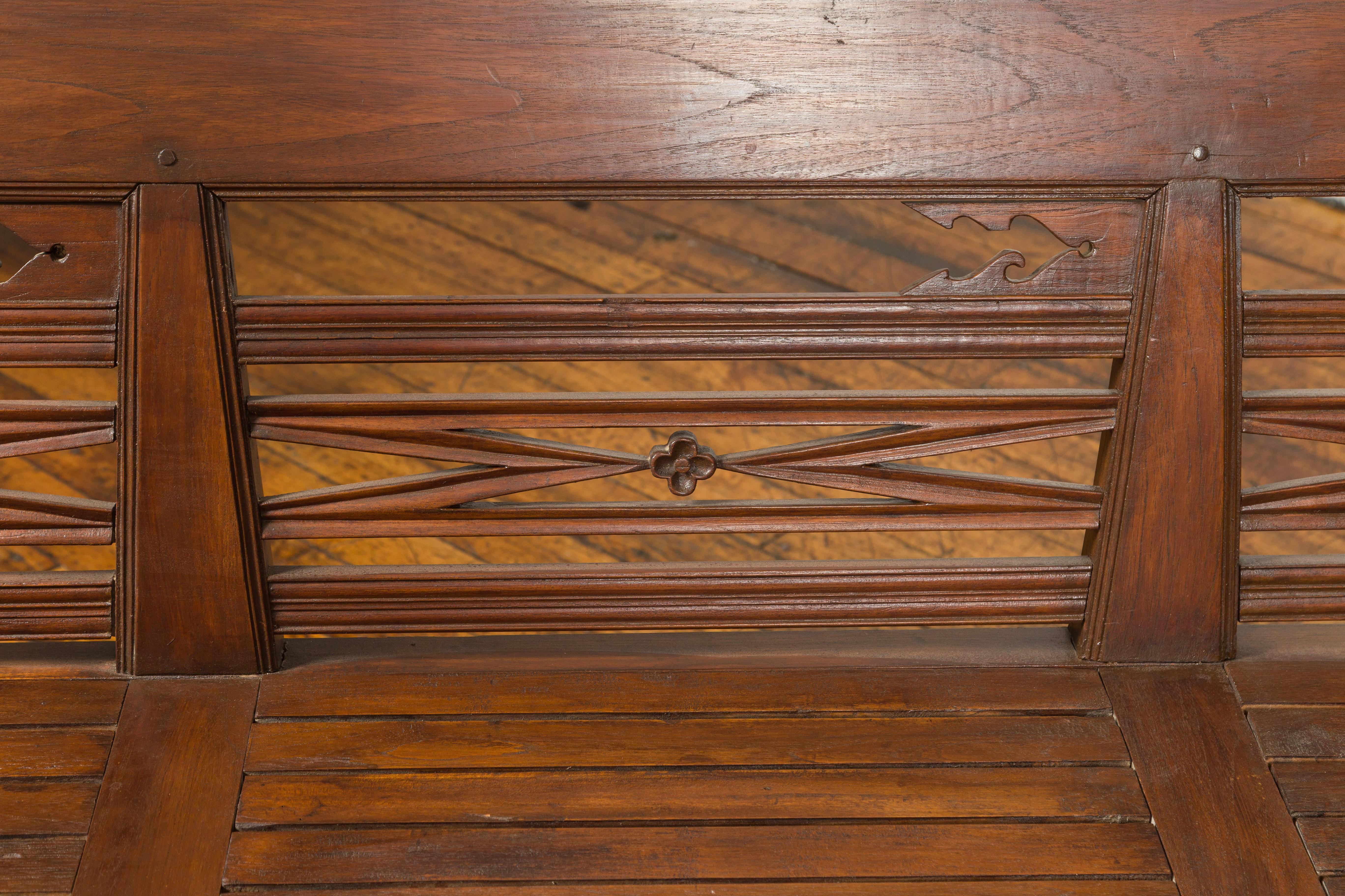 Dutch Colonial Late 19th Century Bench with Pierced Back and Scrolling Arms 3