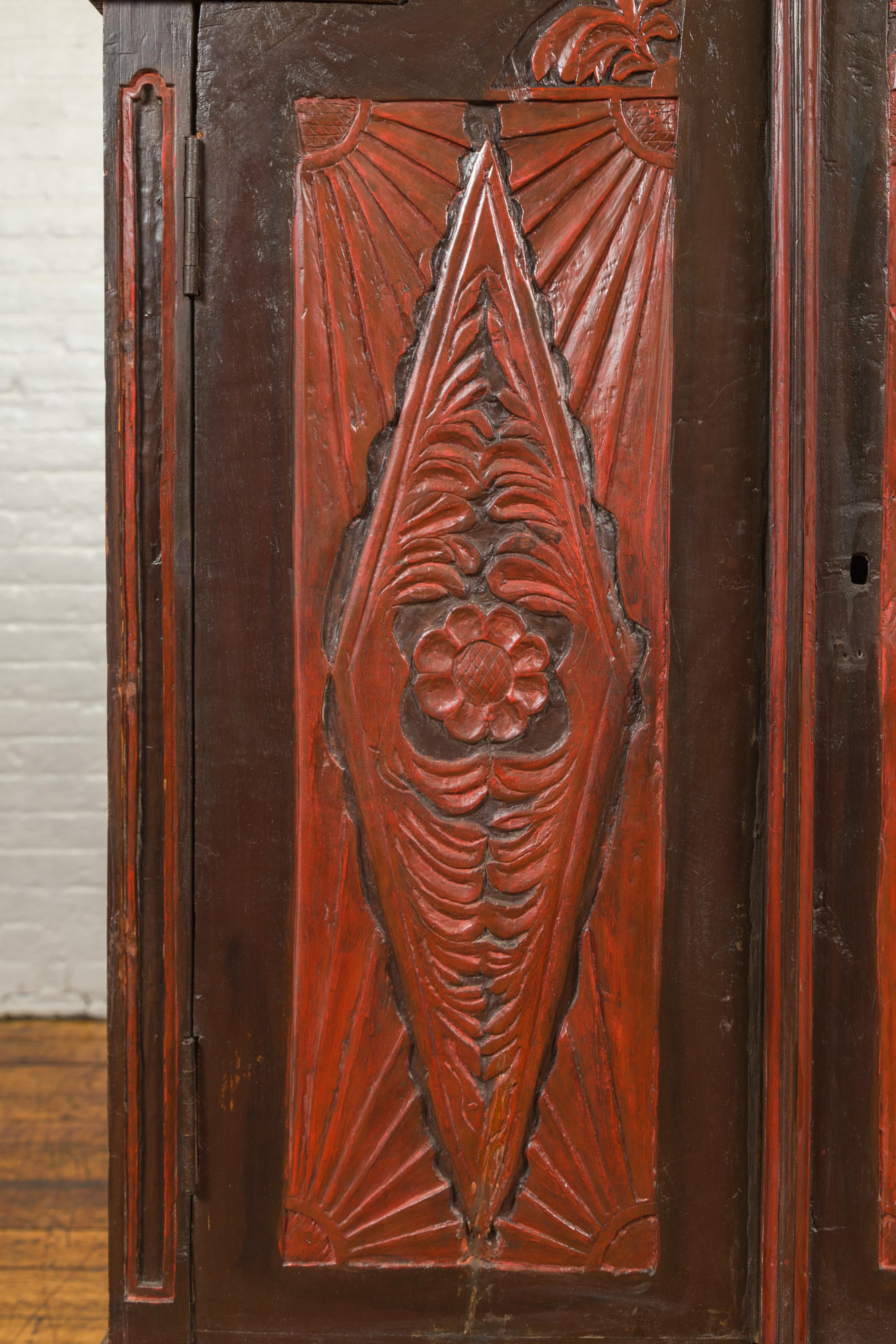 Dutch Colonial Late 19th Century Bonnet Top Cabinet with Carved Doors and Apron For Sale 3