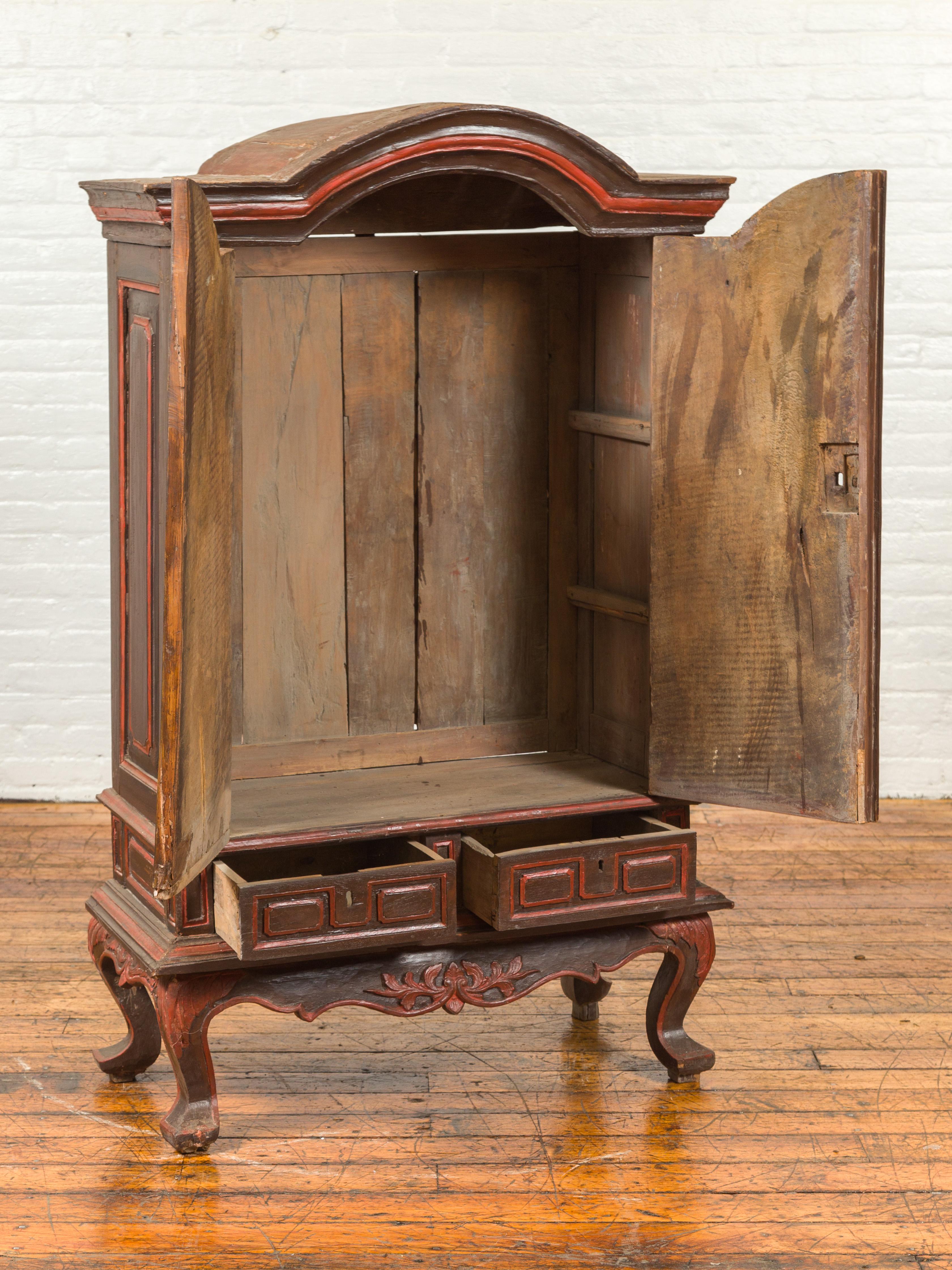 Dutch Colonial Late 19th Century Bonnet Top Cabinet with Carved Doors and Apron For Sale 6