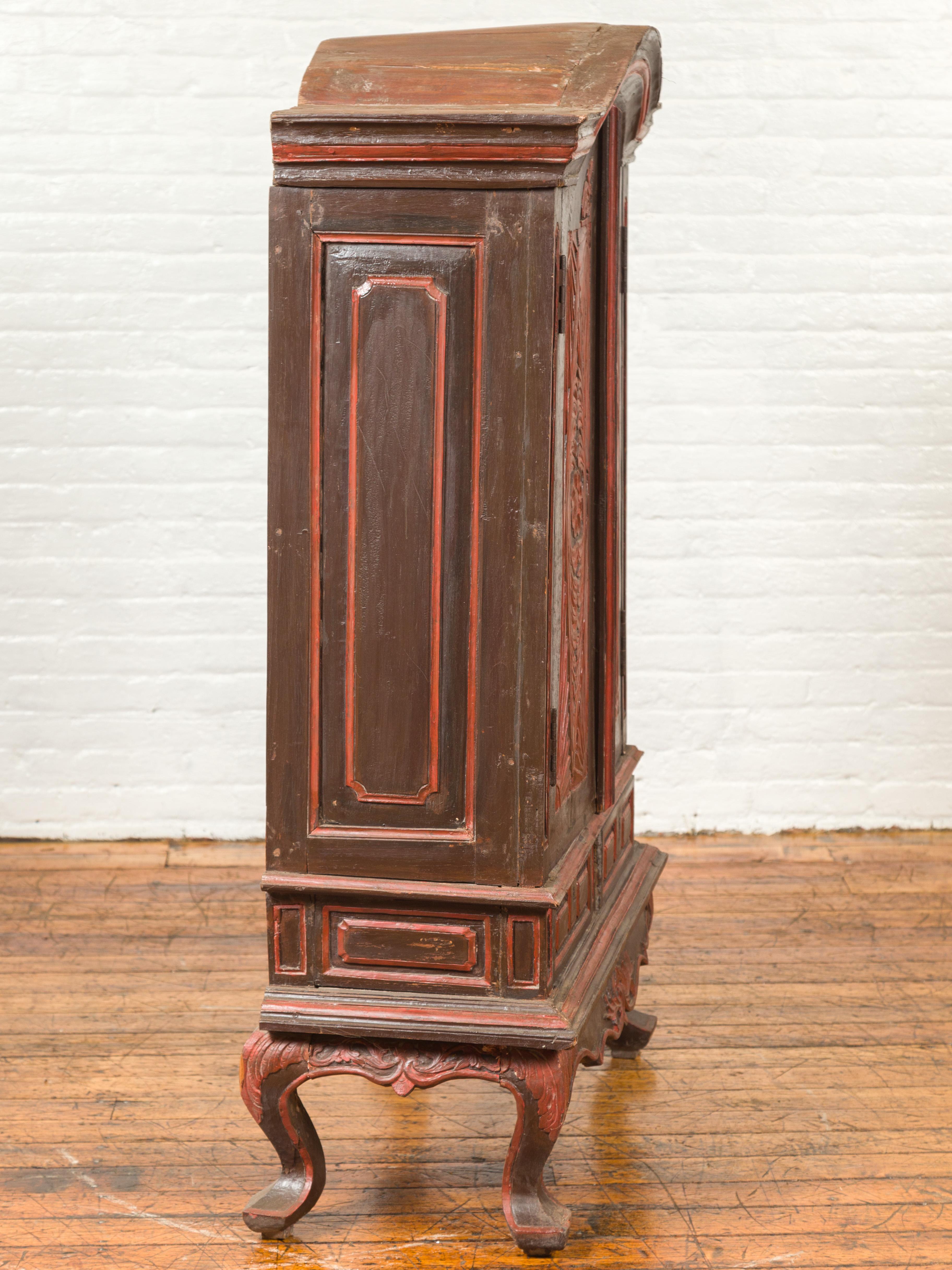 Dutch Colonial Late 19th Century Bonnet Top Cabinet with Carved Doors and Apron For Sale 8