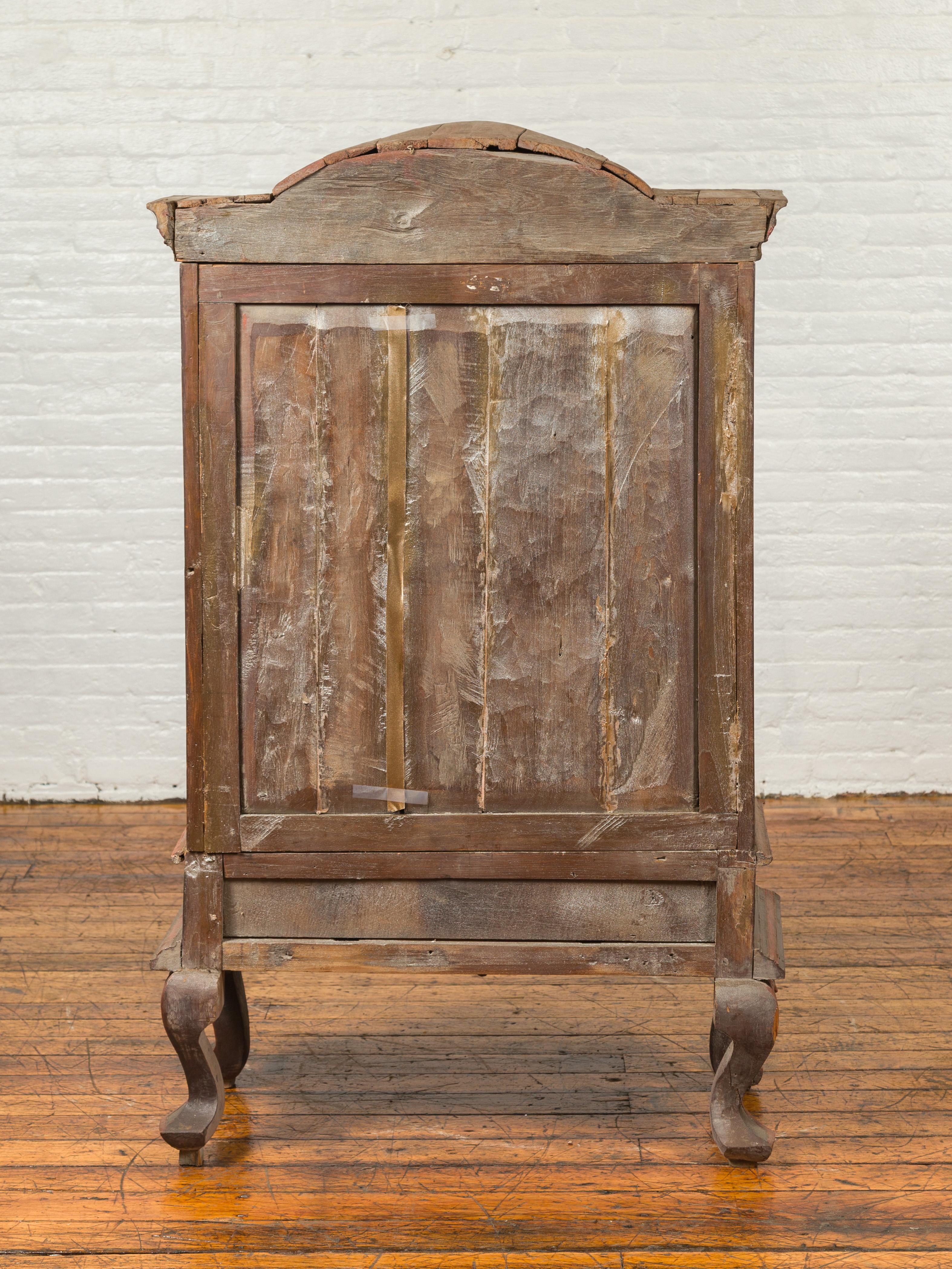 Dutch Colonial Late 19th Century Bonnet Top Cabinet with Carved Doors and Apron For Sale 9