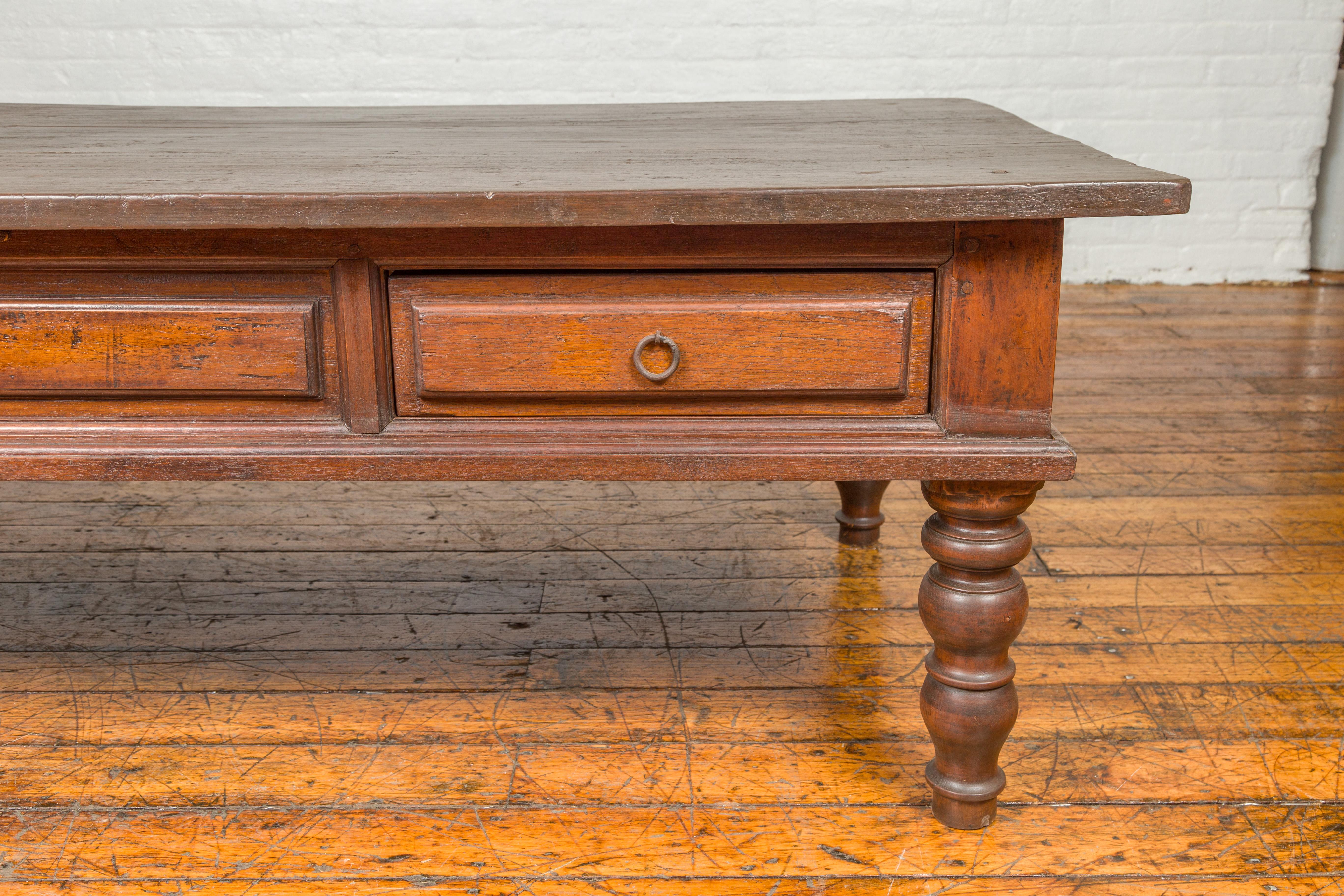 Indonesian Dutch Colonial Late 19th Century Long Coffee Table with Drawers and Turned Legs