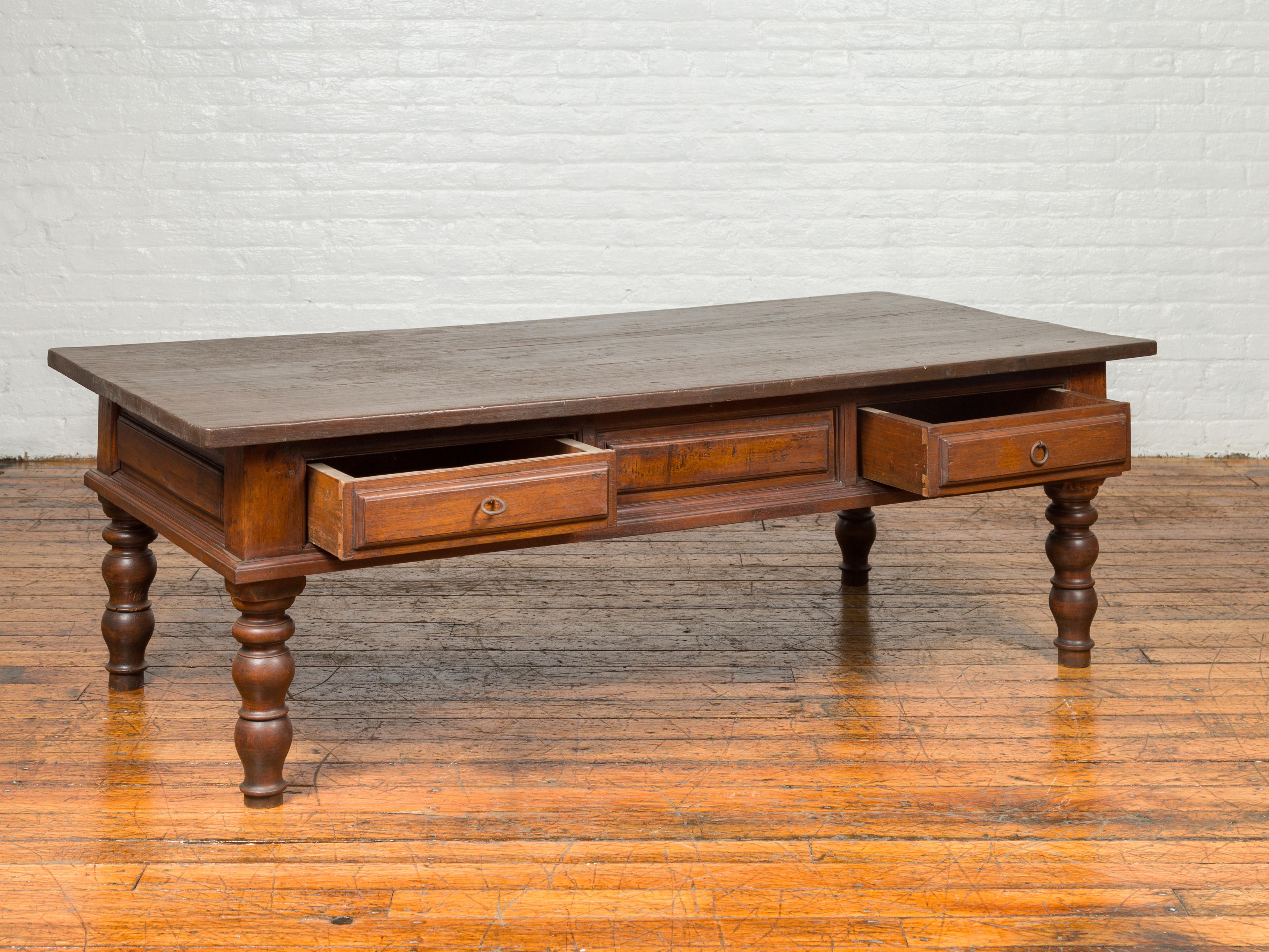 Wood Dutch Colonial Late 19th Century Long Coffee Table with Drawers and Turned Legs