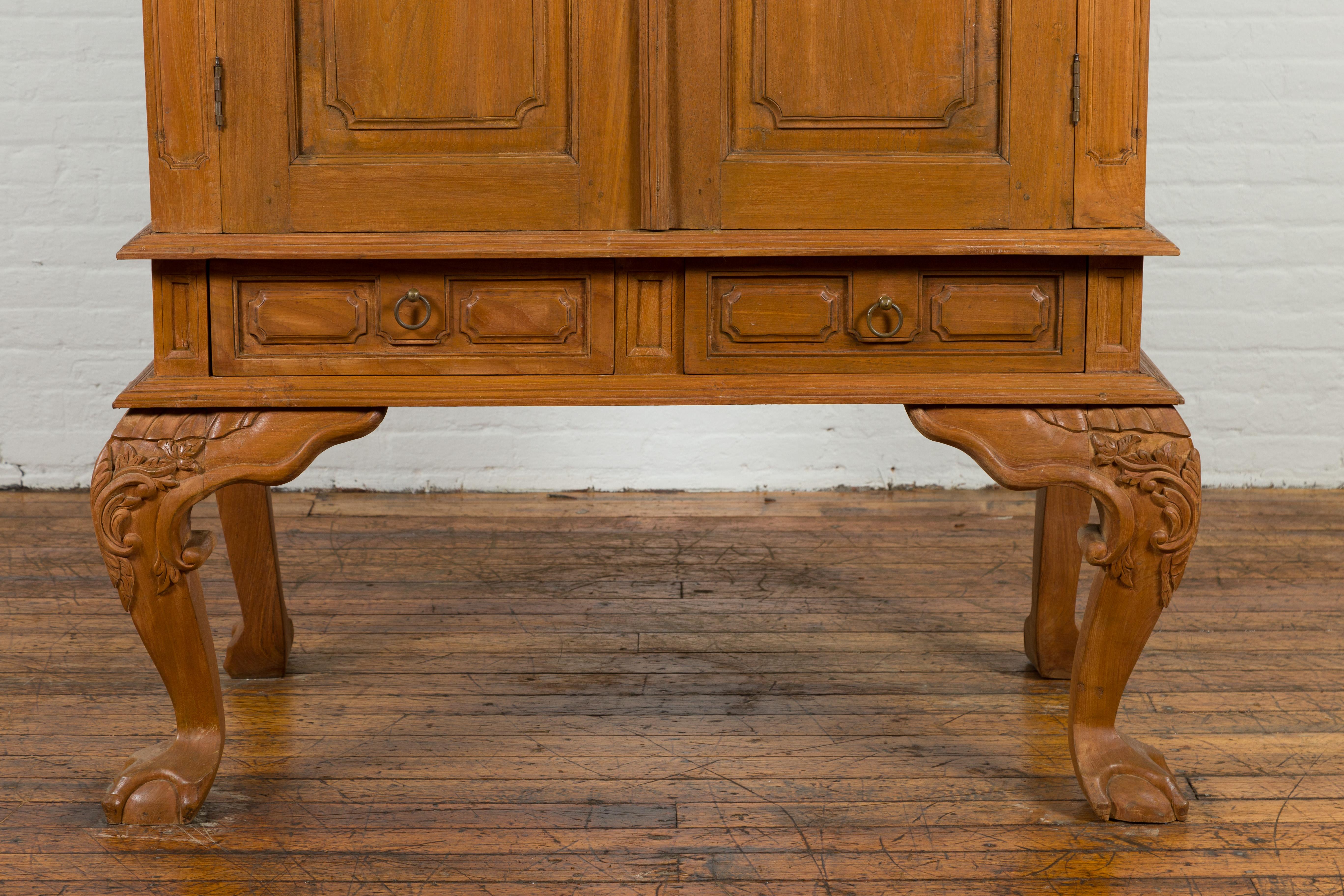 Dutch Colonial Late 19th Century Teak Cabinet with Bonnet Top and Cabriole Legs In Good Condition For Sale In Yonkers, NY