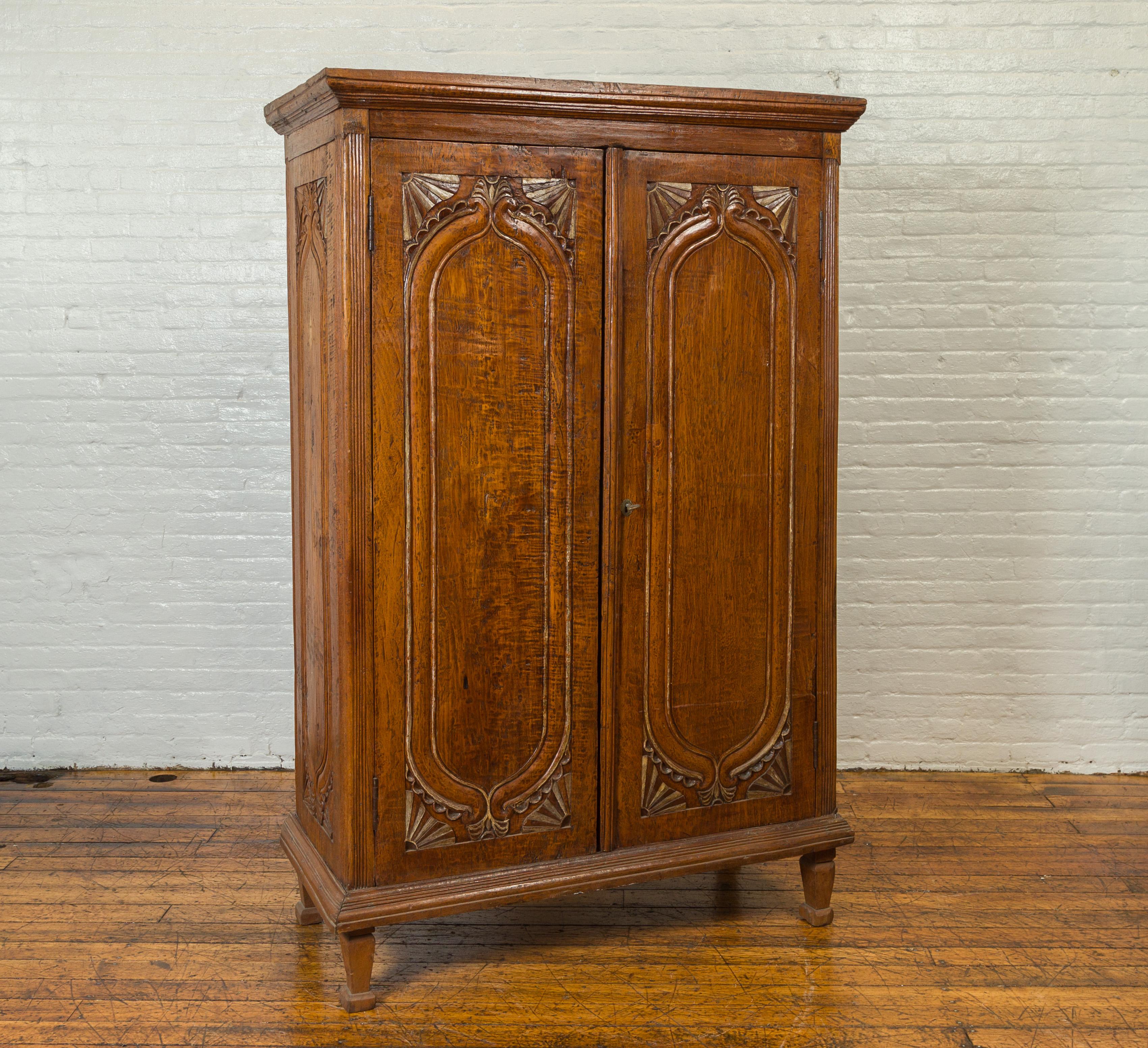 Indonesian Dutch Colonial Late 19th Century Teak Wood Cabinet with Carved Fan Motifs