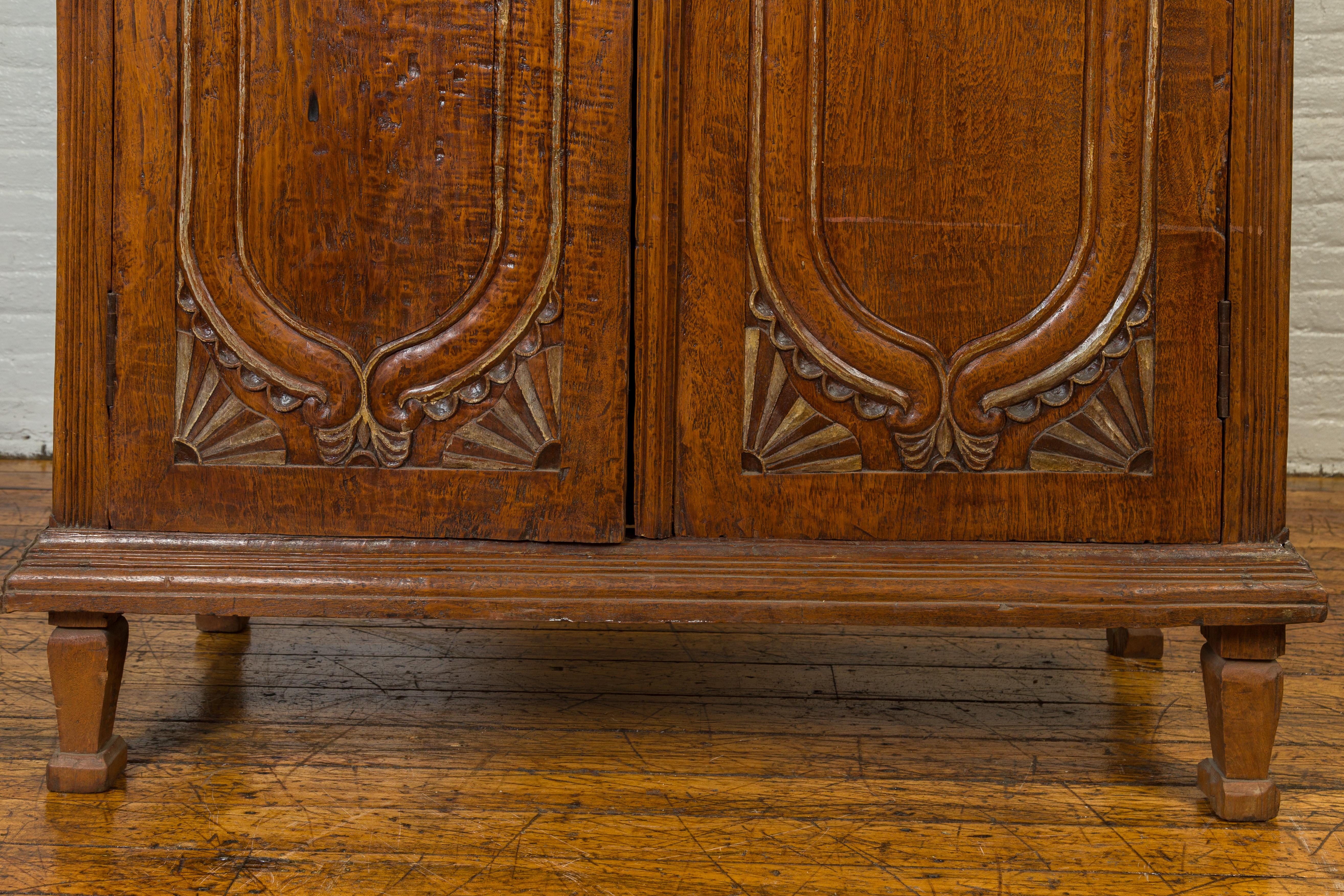 Dutch Colonial Late 19th Century Teak Wood Cabinet with Carved Fan Motifs 4