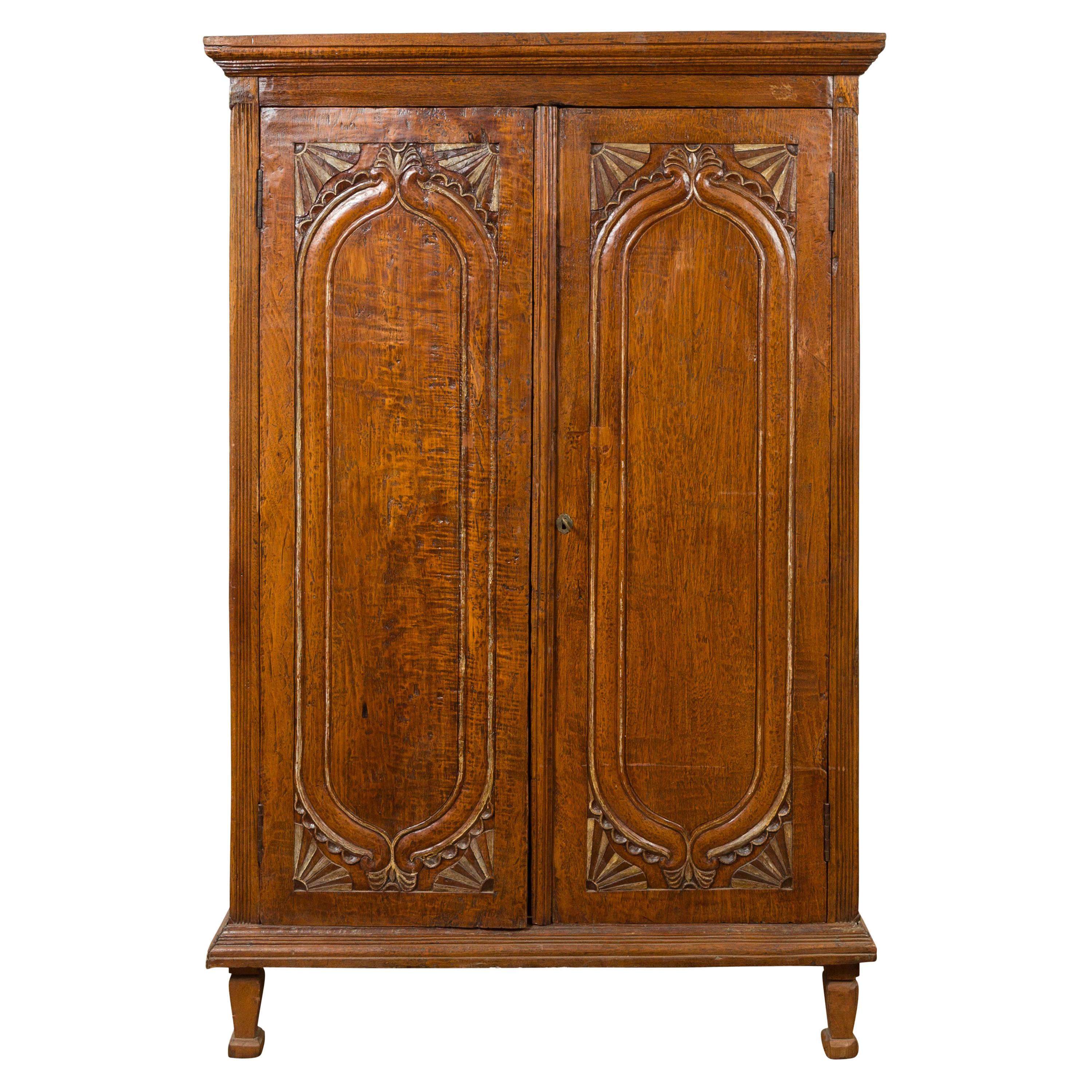 Dutch Colonial Late 19th Century Teak Wood Cabinet with Carved Fan Motifs