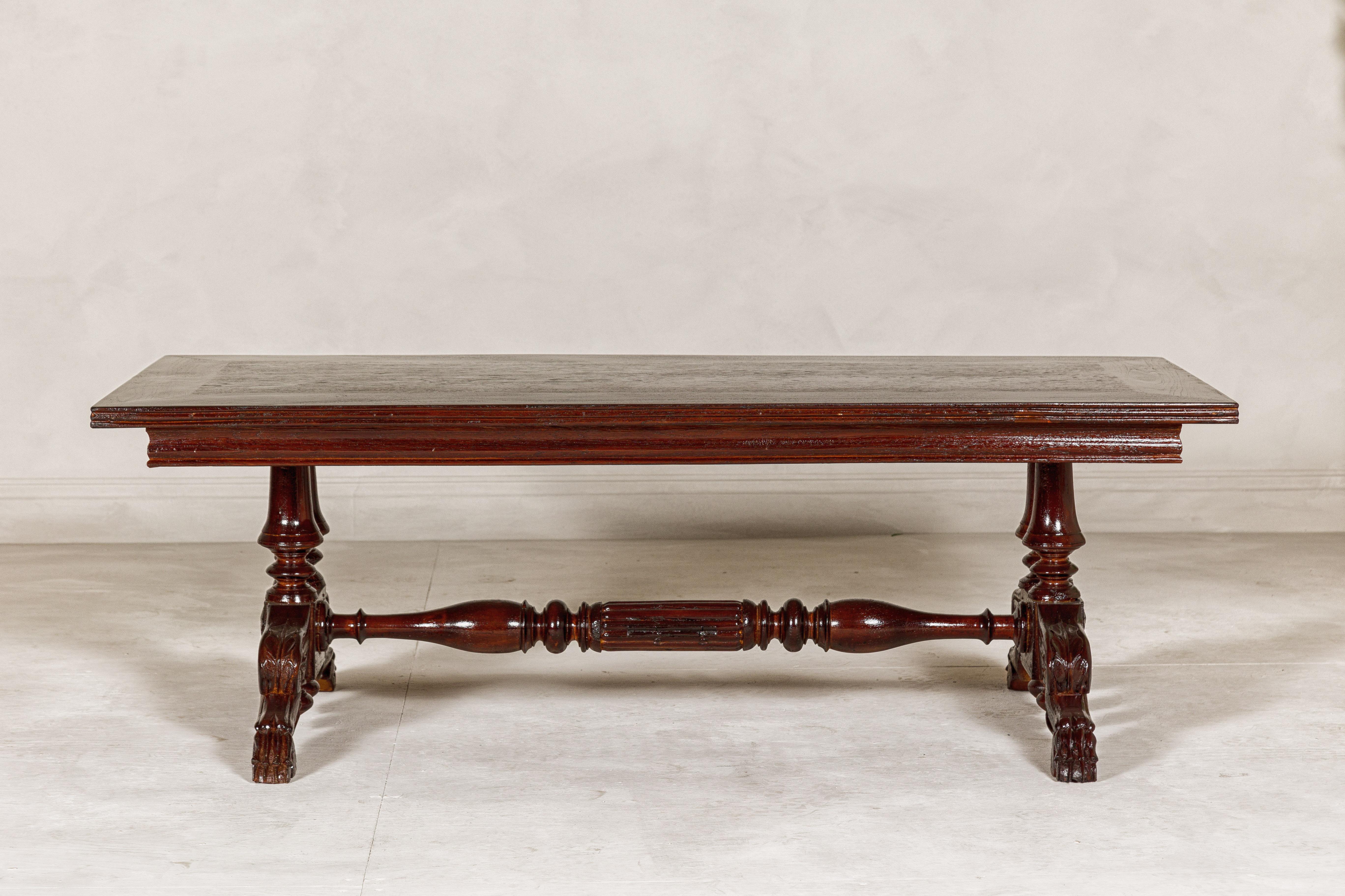 Dutch Colonial Ornate Coffee Table with Carved Lion Paw Legs and Cross Stretcher For Sale 9