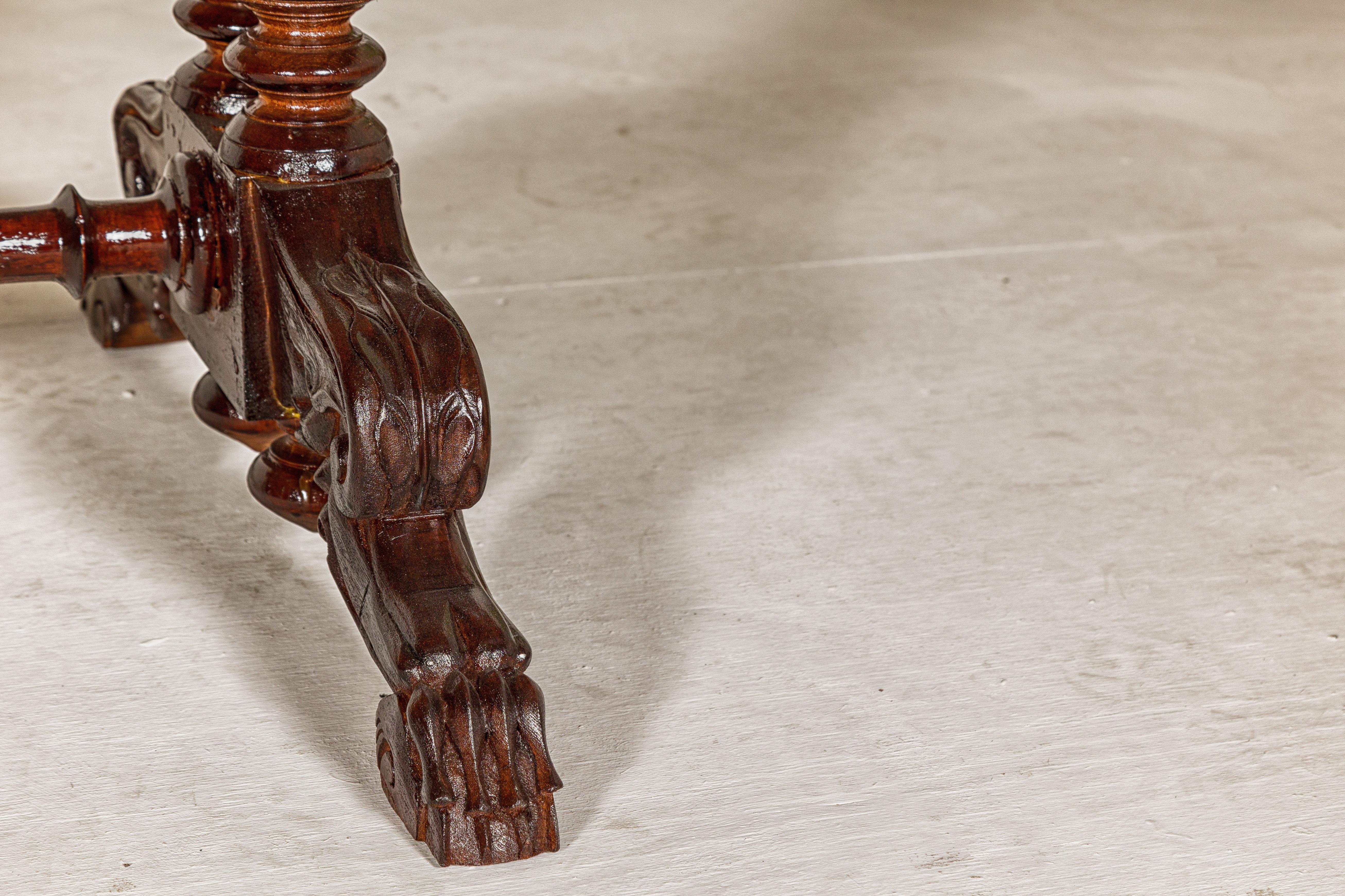 Dutch Colonial Ornate Coffee Table with Carved Lion Paw Legs and Cross Stretcher For Sale 1