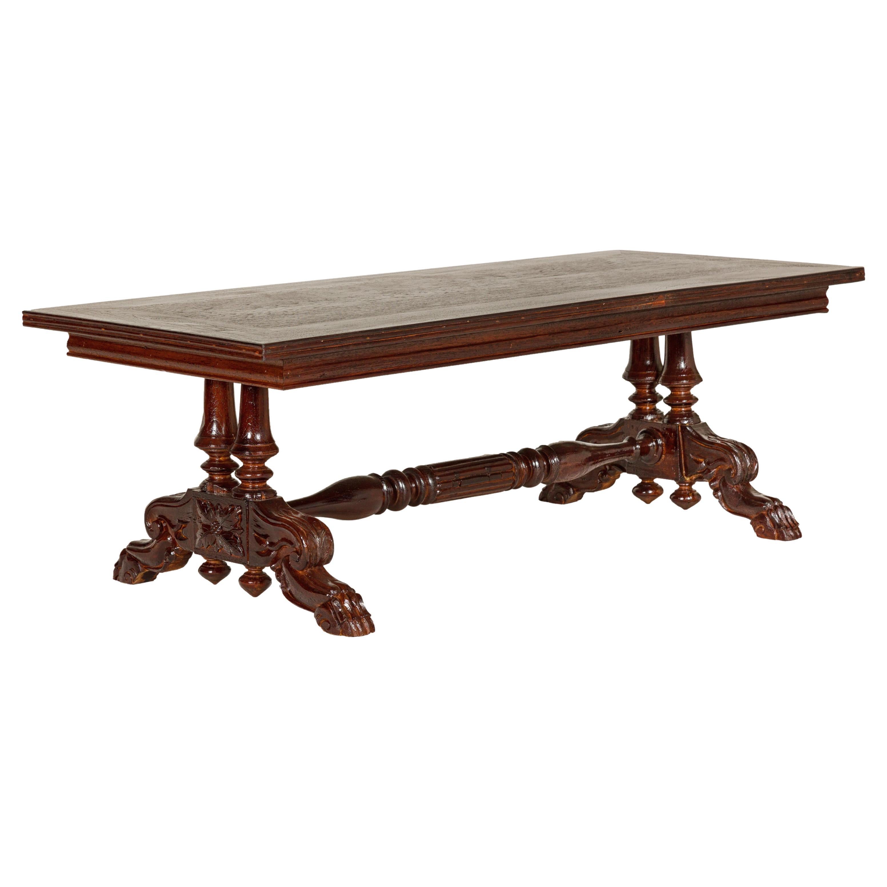 Dutch Colonial Ornate Coffee Table with Carved Lion Paw Legs and Cross Stretcher For Sale