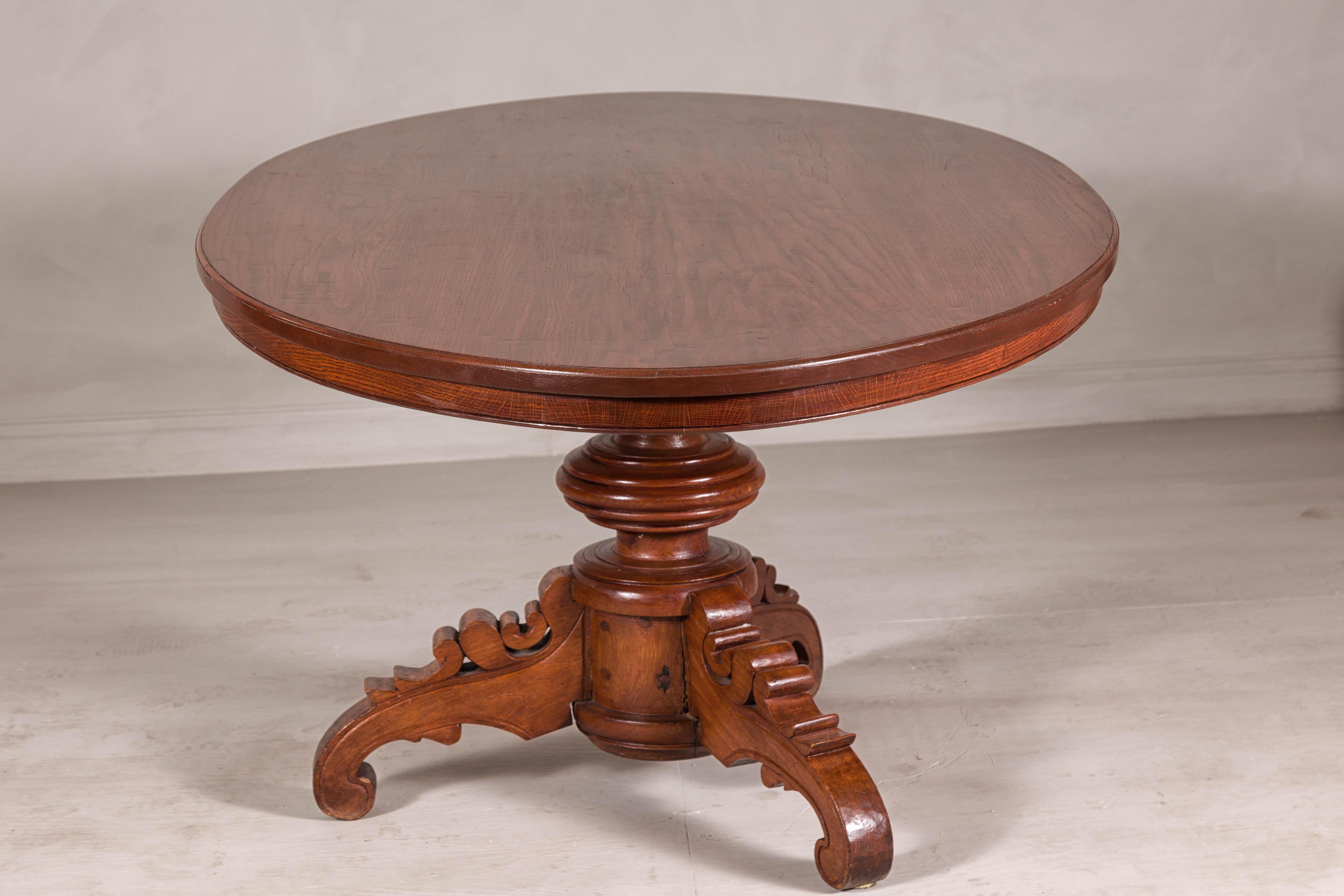 Dutch Colonial Oval Pedestal Dining Table with Scrolling Base, Late 19th Century For Sale 2
