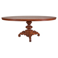 Tavolo da pranzo ovale coloniale olandese con piedistallo e base a spirale, fine XIX secolo
