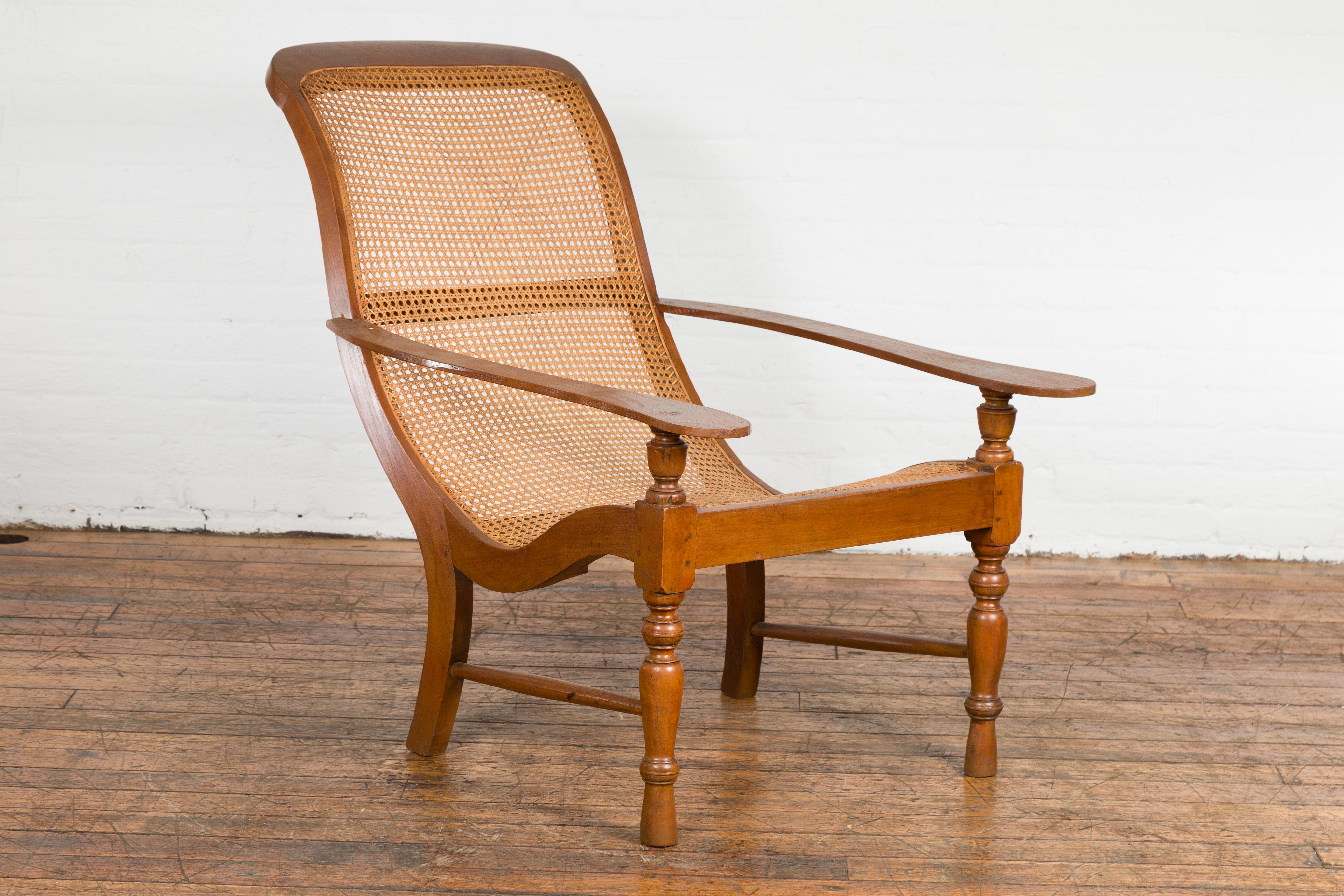 Antique Lounge Chair with Curved Seat and Extended Back For Sale 2
