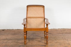 Antique Lounge Chair with Curved Seat and Extended Back
