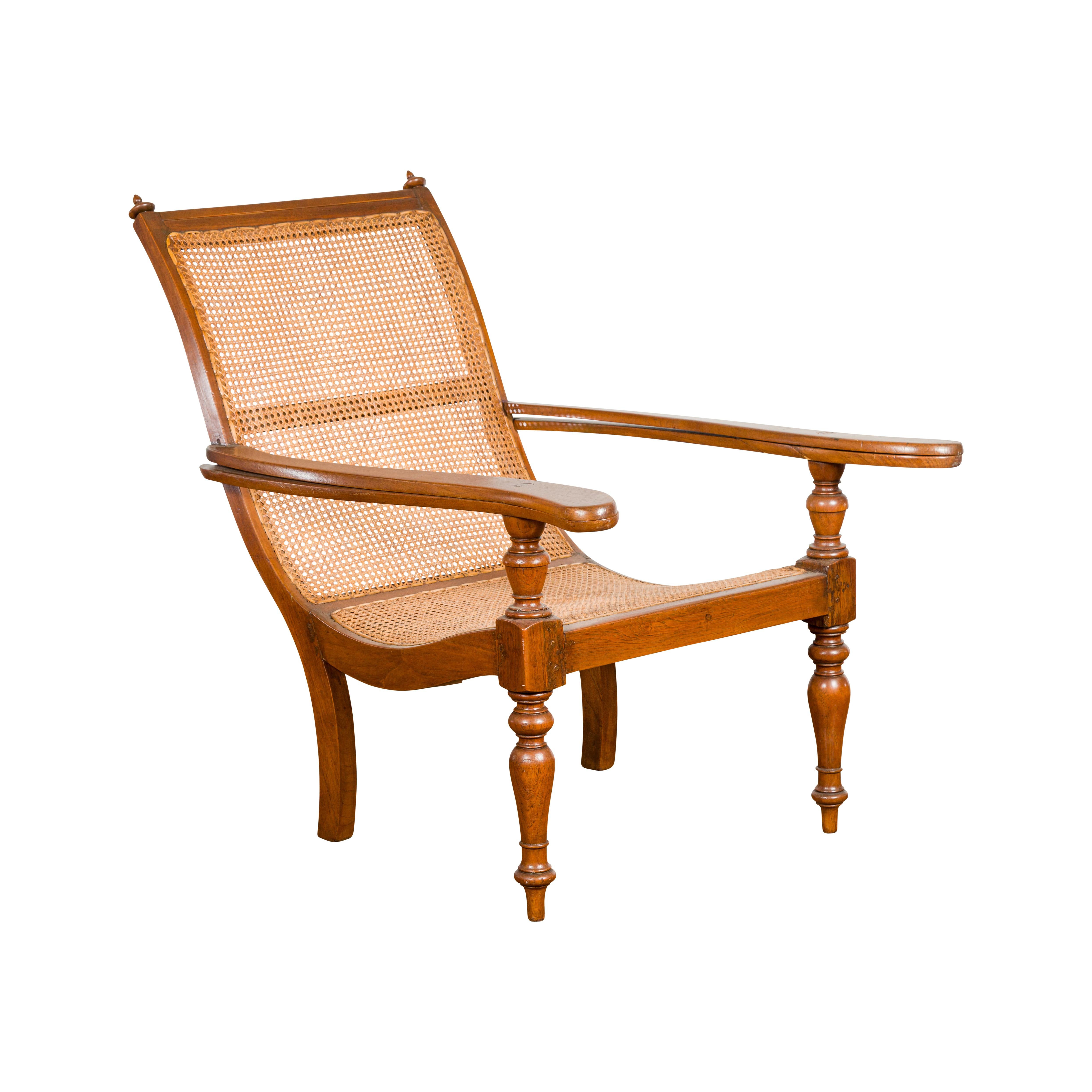 Dutch Colonial Period Wood and Rattan Lounge Chair with Extending Arms For Sale 3