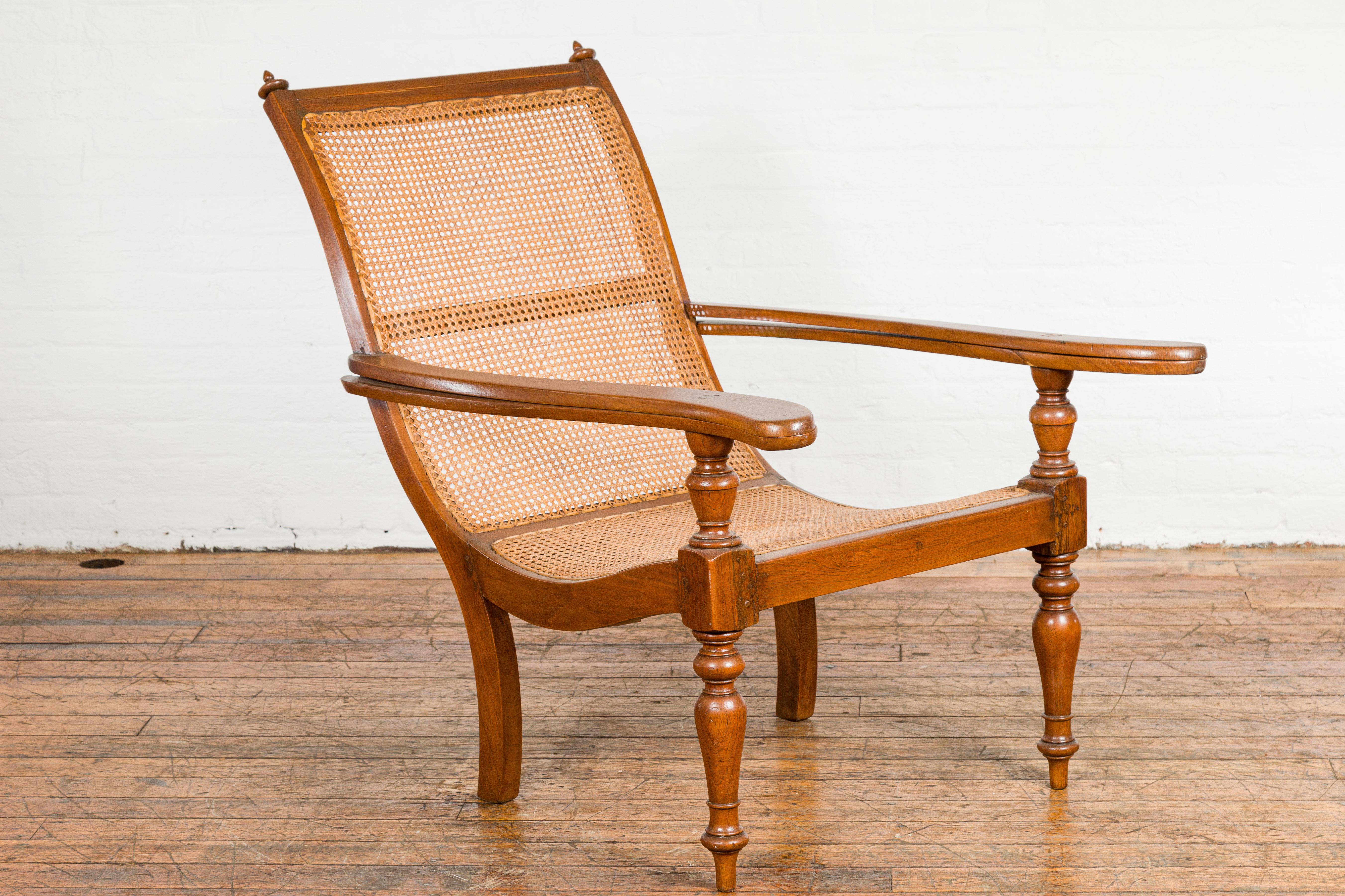 Turned Dutch Colonial Period Wood and Rattan Lounge Chair with Extending Arms For Sale
