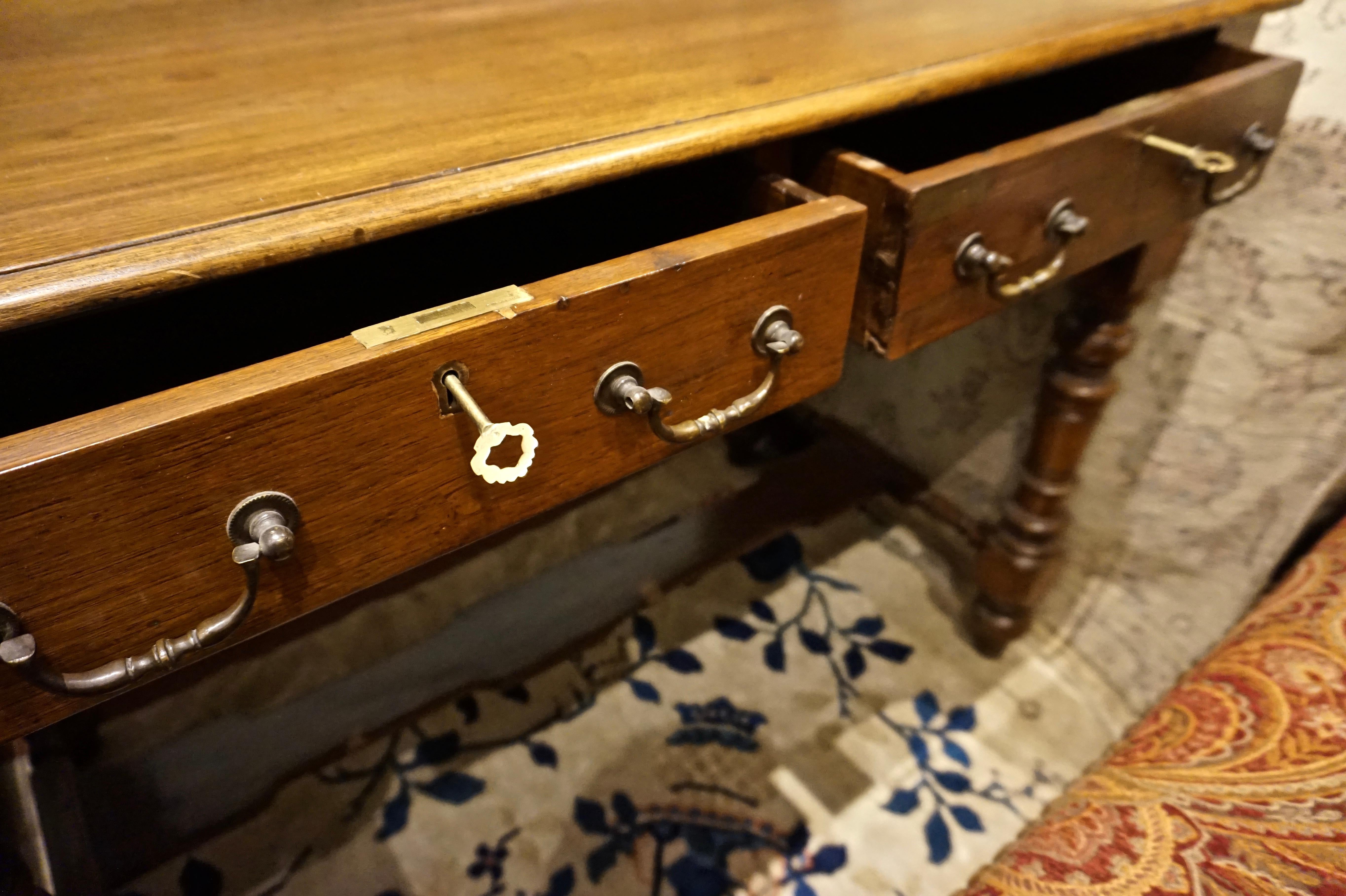 Dutch Colonial Teak Desk with Brass Hardware In Good Condition For Sale In Vancouver, British Columbia