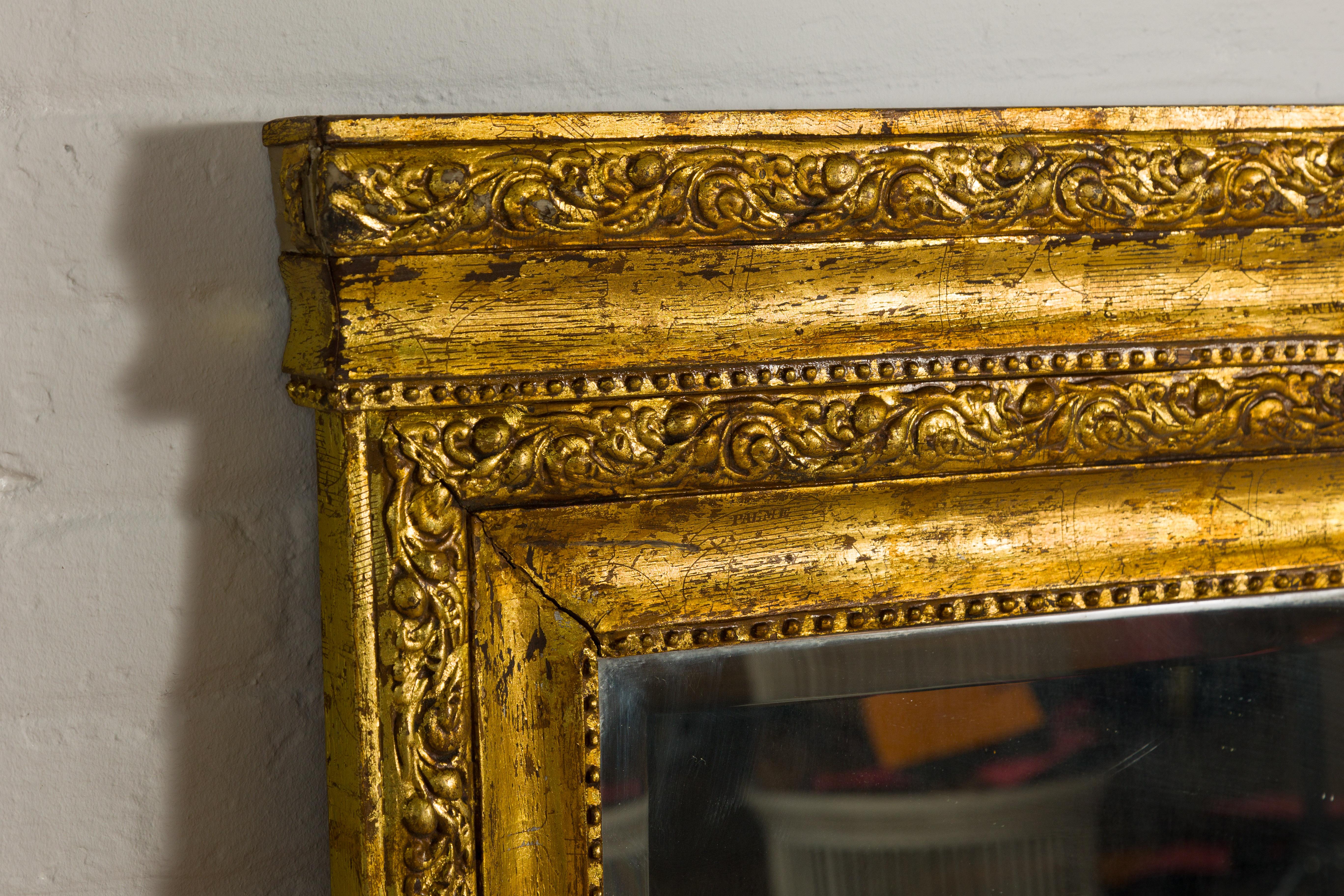 Dutch Colonial Vintage Giltwood Trumeau Mirror with Carved Scrollwork Motifs For Sale 4