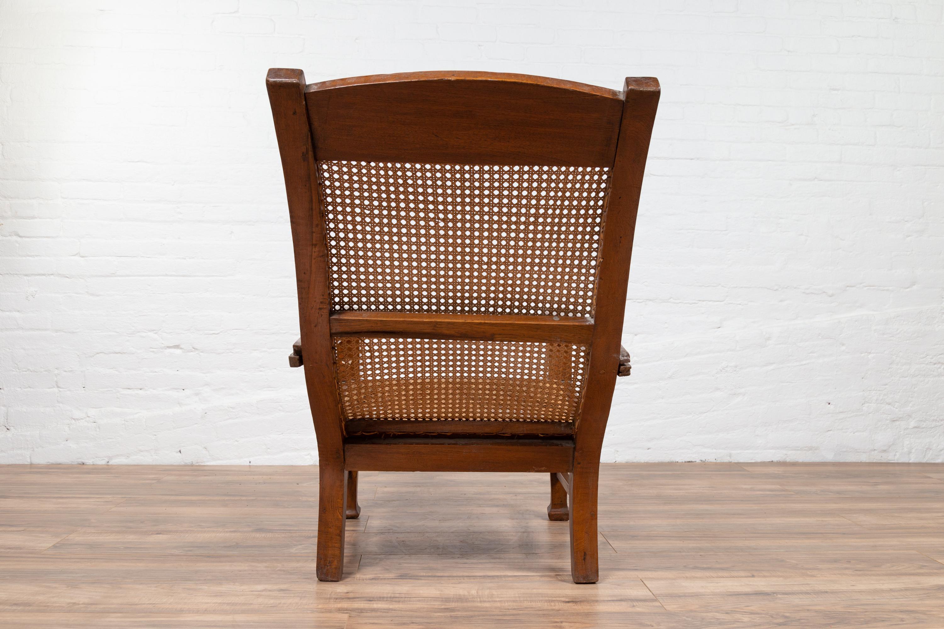 Dutch Colonial Vintage Plantation Lounge Chair with Curving Seat and Rattan 2