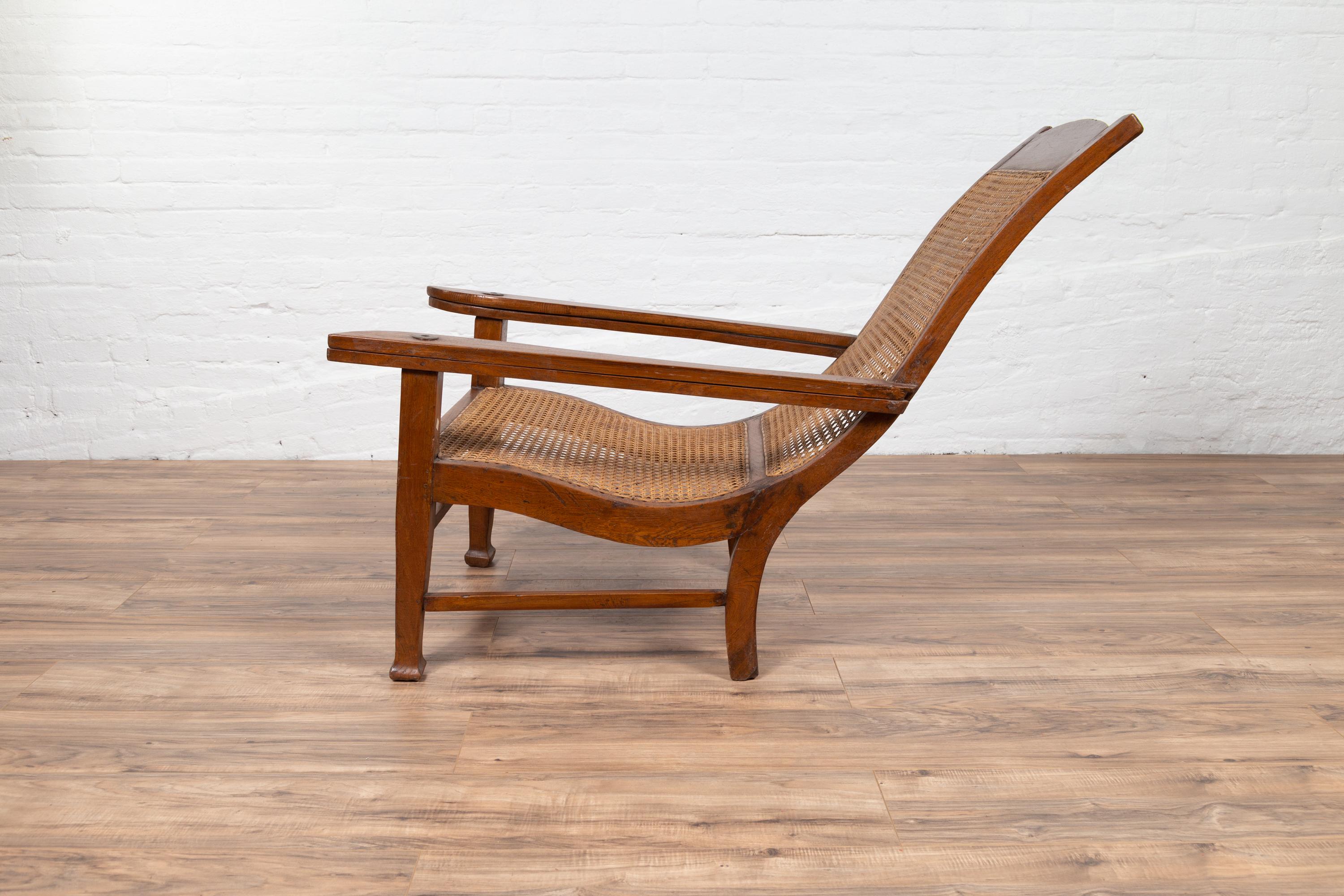 Dutch Colonial Vintage Plantation Lounge Chair with Curving Seat and Rattan 3