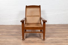 Dutch Colonial Vintage Plantation Lounge Chair with Curving Seat and Rattan