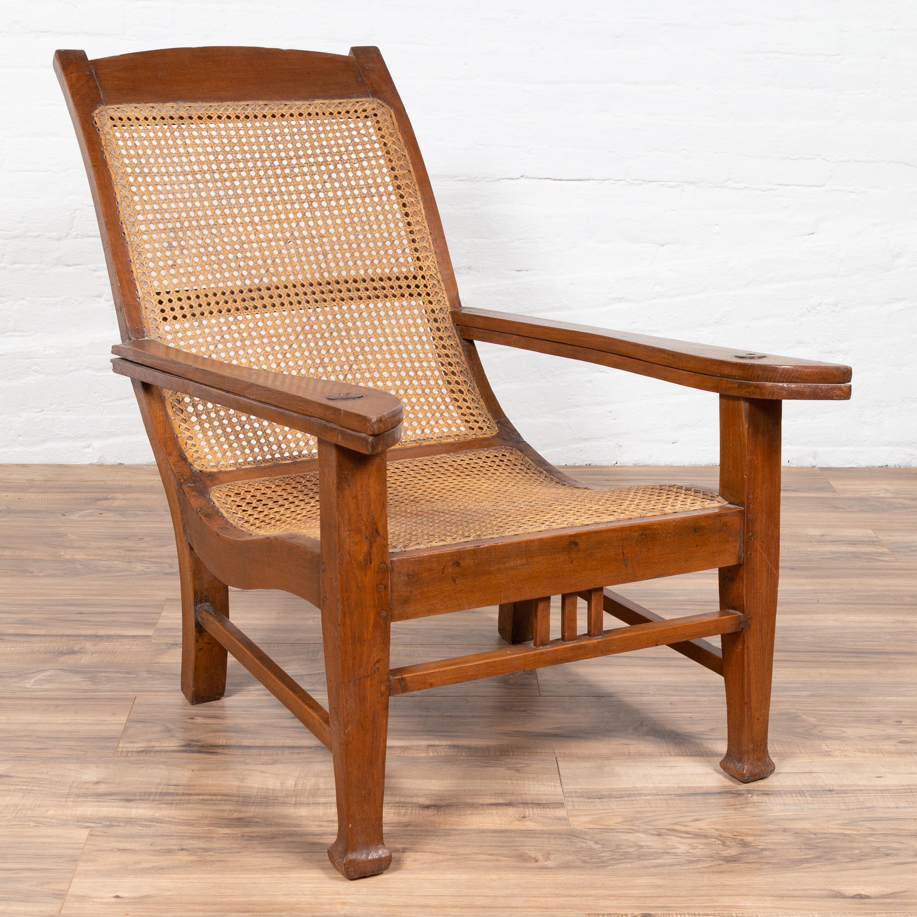 Dutch Colonial Vintage Plantation Lounge Chair with Curving Seat and Rattan In Good Condition In Yonkers, NY