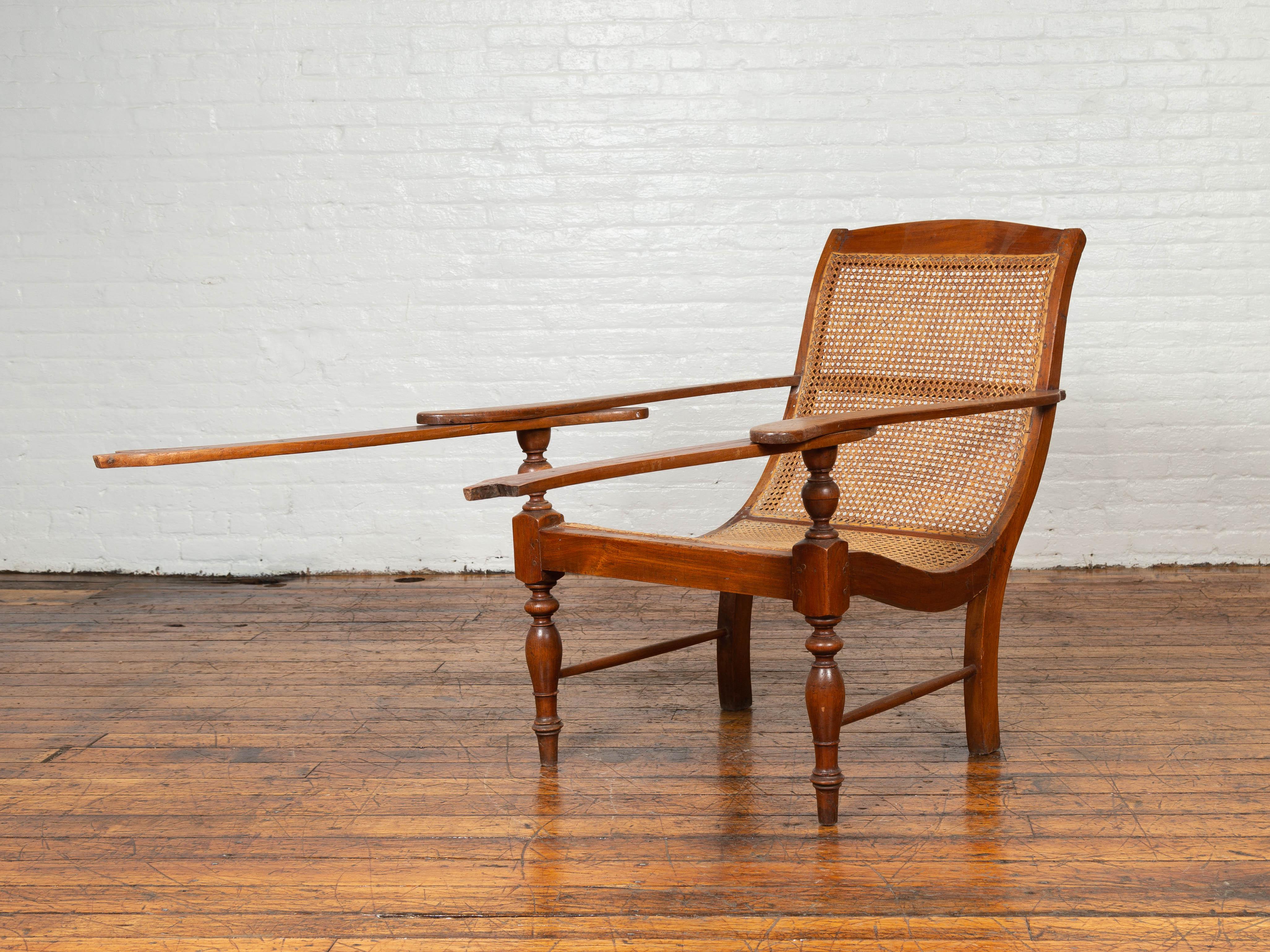Dutch Colonial Vintage Teak Plantation Lounge Chair with Curving Seat and Rattan 2