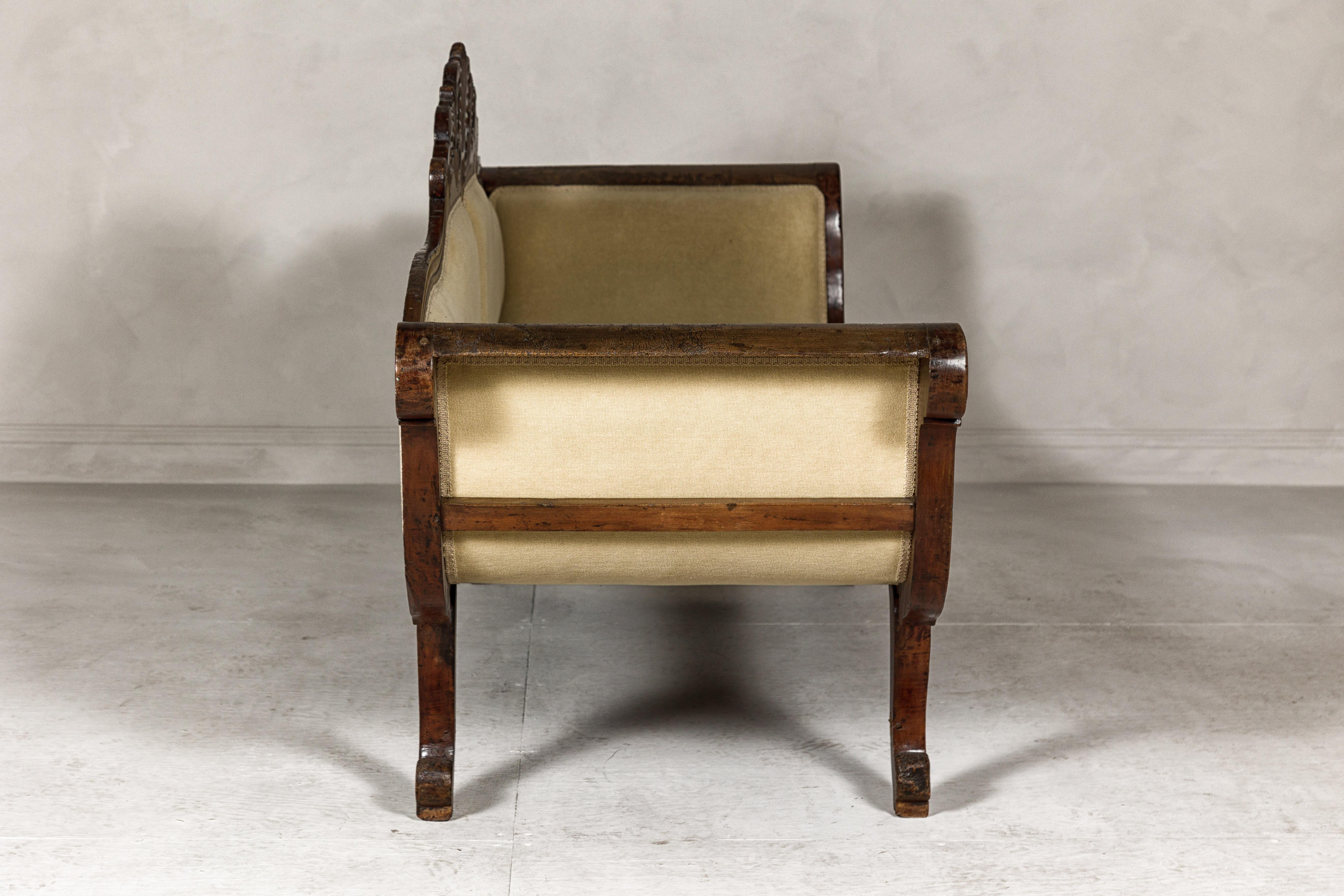 Dutch Colonial Wooden Settee with Carved Crest and Out-Scrolling Arms For Sale 7