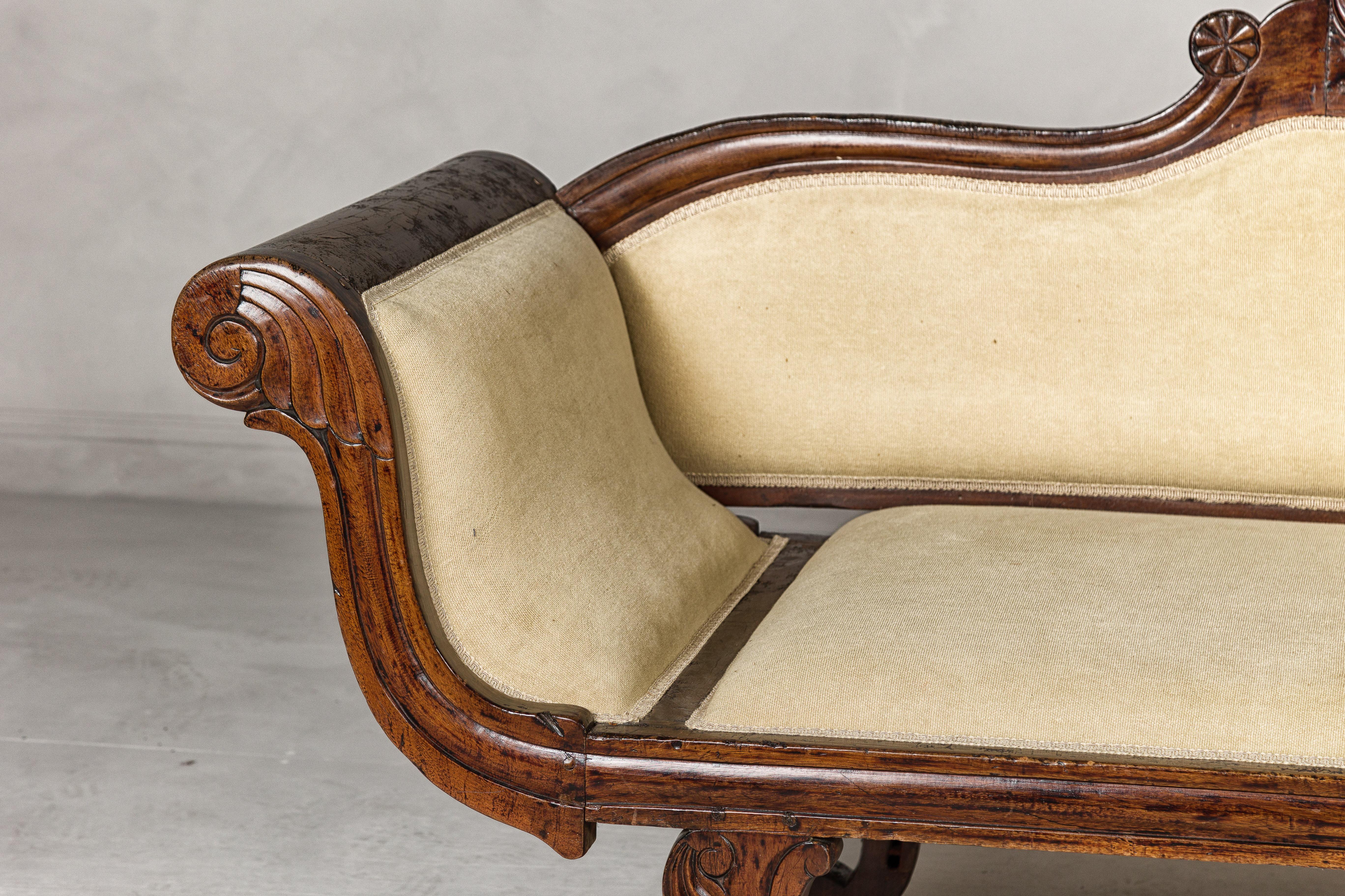20th Century Dutch Colonial Wooden Settee with Carved Crest and Out-Scrolling Arms For Sale